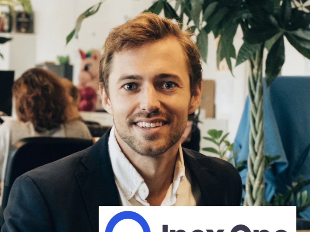 Headshot of Inex One CEO Max Friberg, with Peerspectrum and Inex One logos
