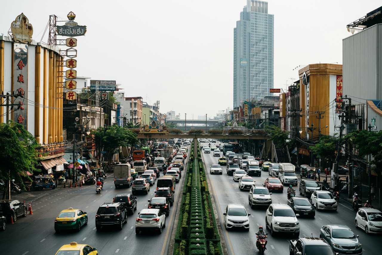 image of a busy city street with trees