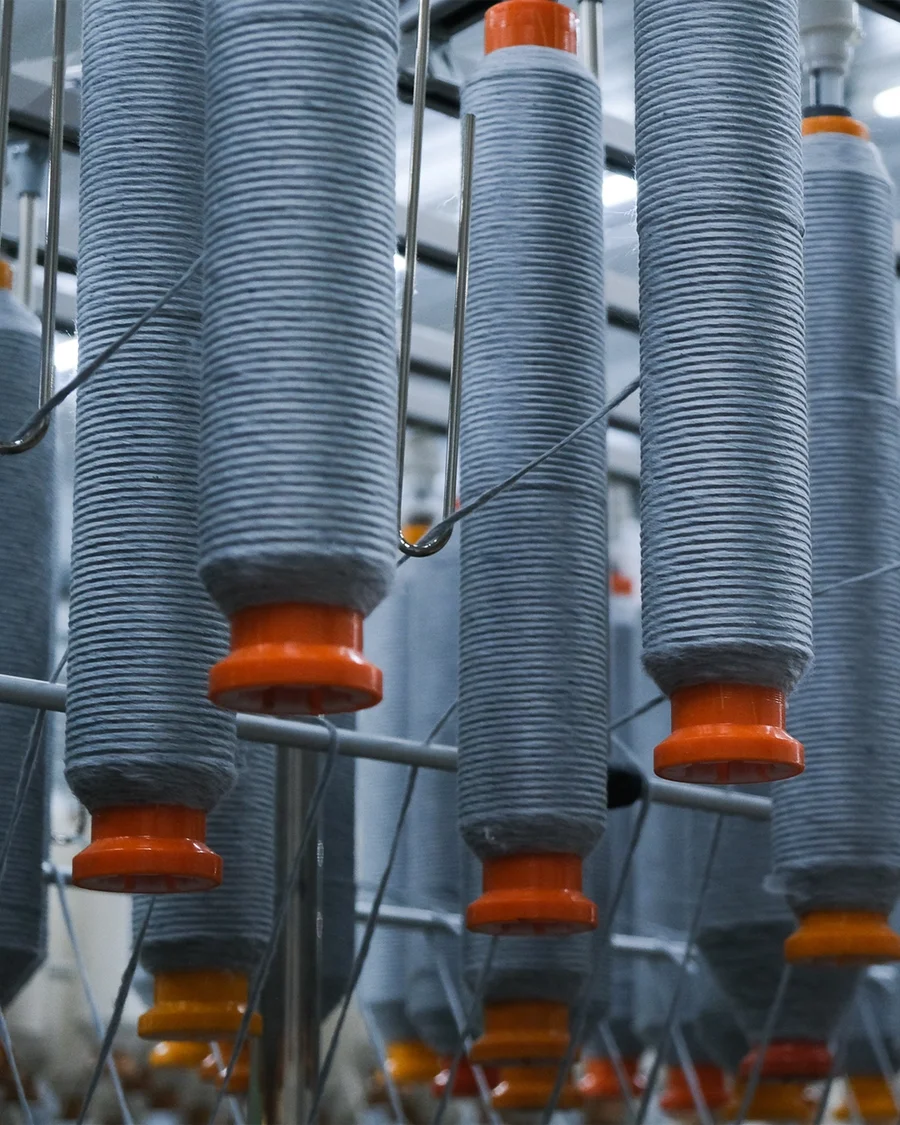 Post-consumer recycled cotton yarn