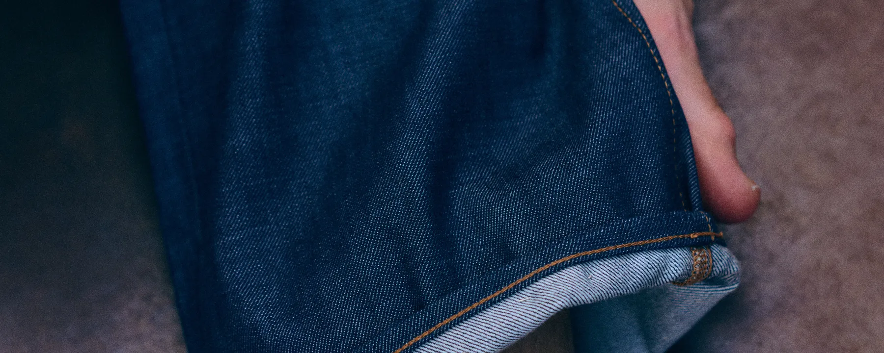 Model wearing the Kuyichi K25 limited edition dry denim jeans, campaign photograph