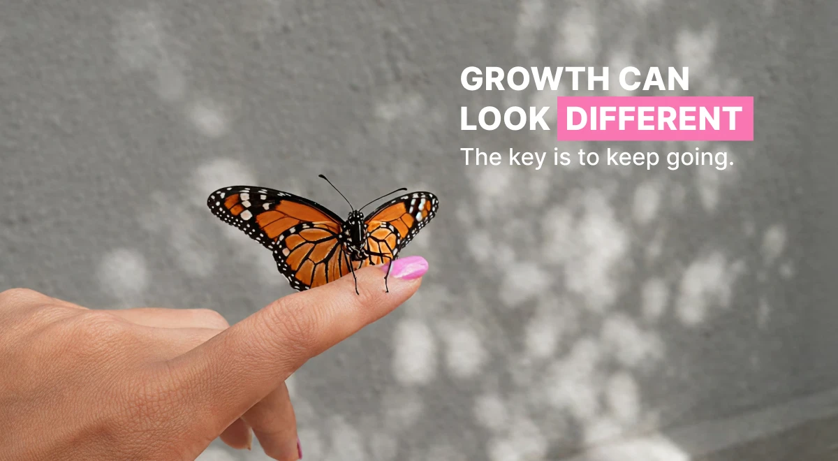 Monarch butterfly perched on a fingertip against a blurred bokeh background, illustrating that growth can look different on a learning journey