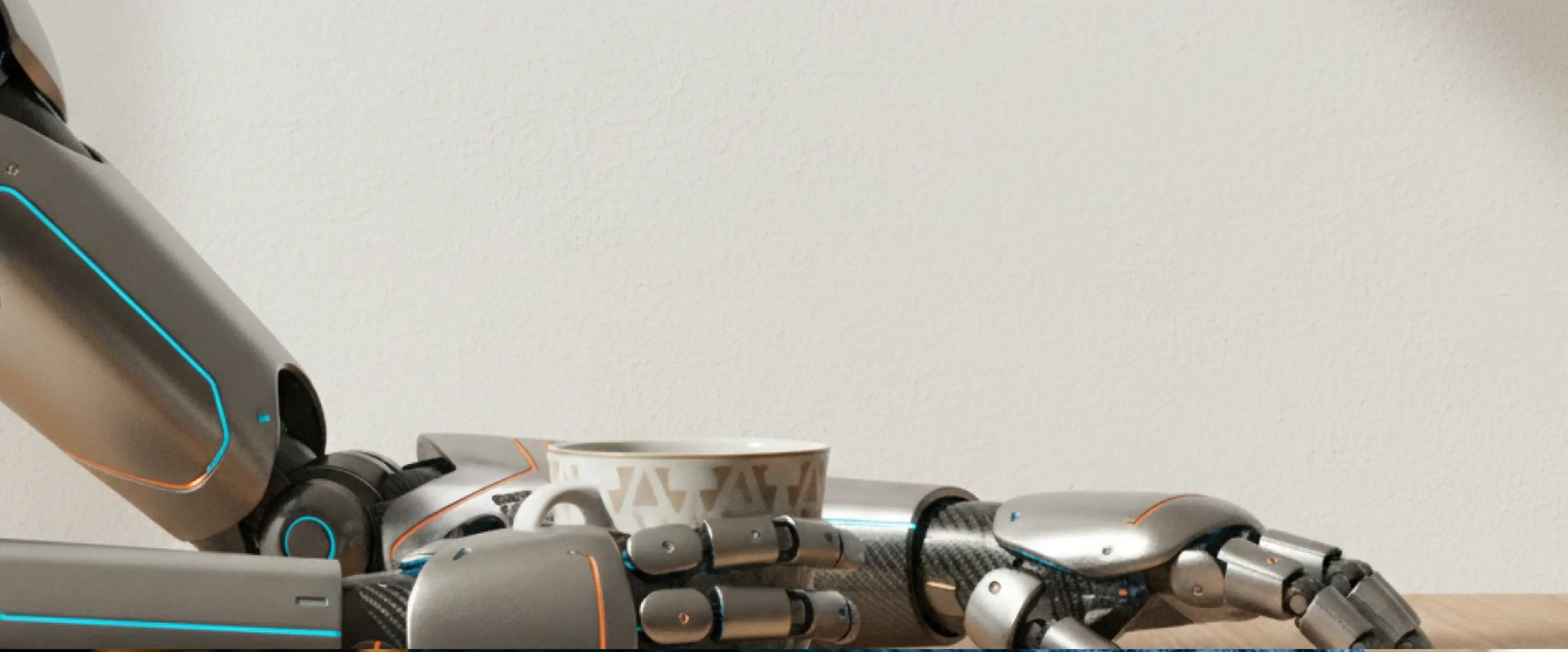 Close-up of a metallic robotic arm with cyan and orange accents resting on a wooden surface next to a coffee cup, symbolizing AI technology and cyber security threats