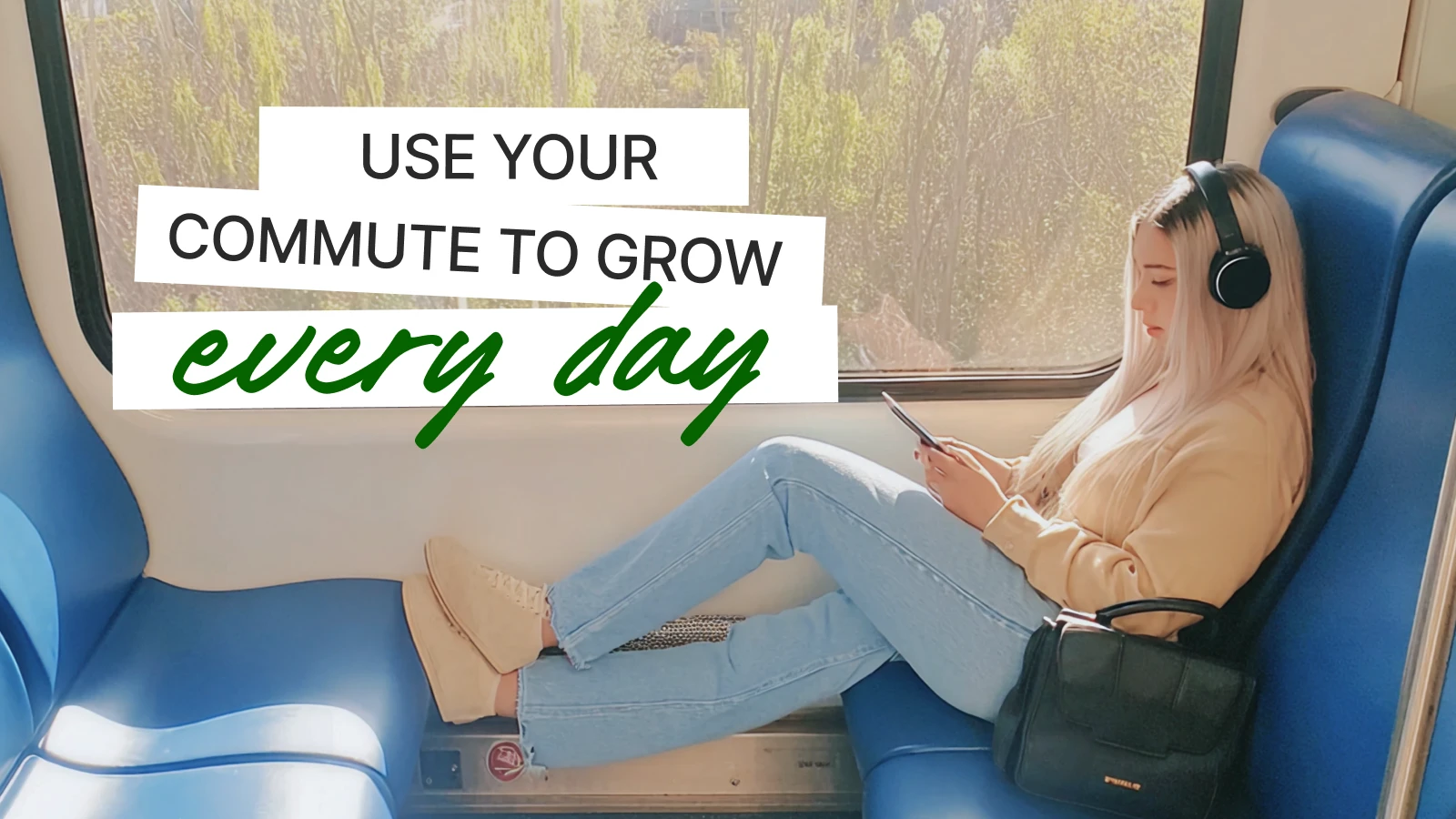 Woman with headphones sits by train window holding phone, suggesting daily microlearning on commute to Grow Every Day