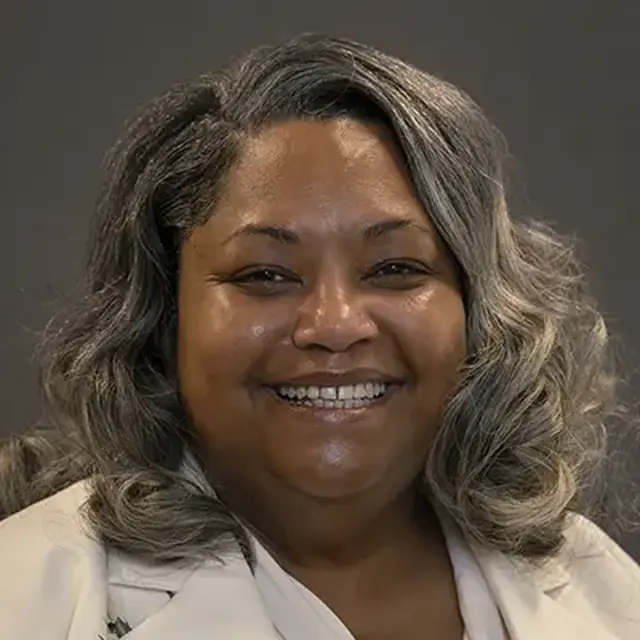 A headshot of Reva Henderson