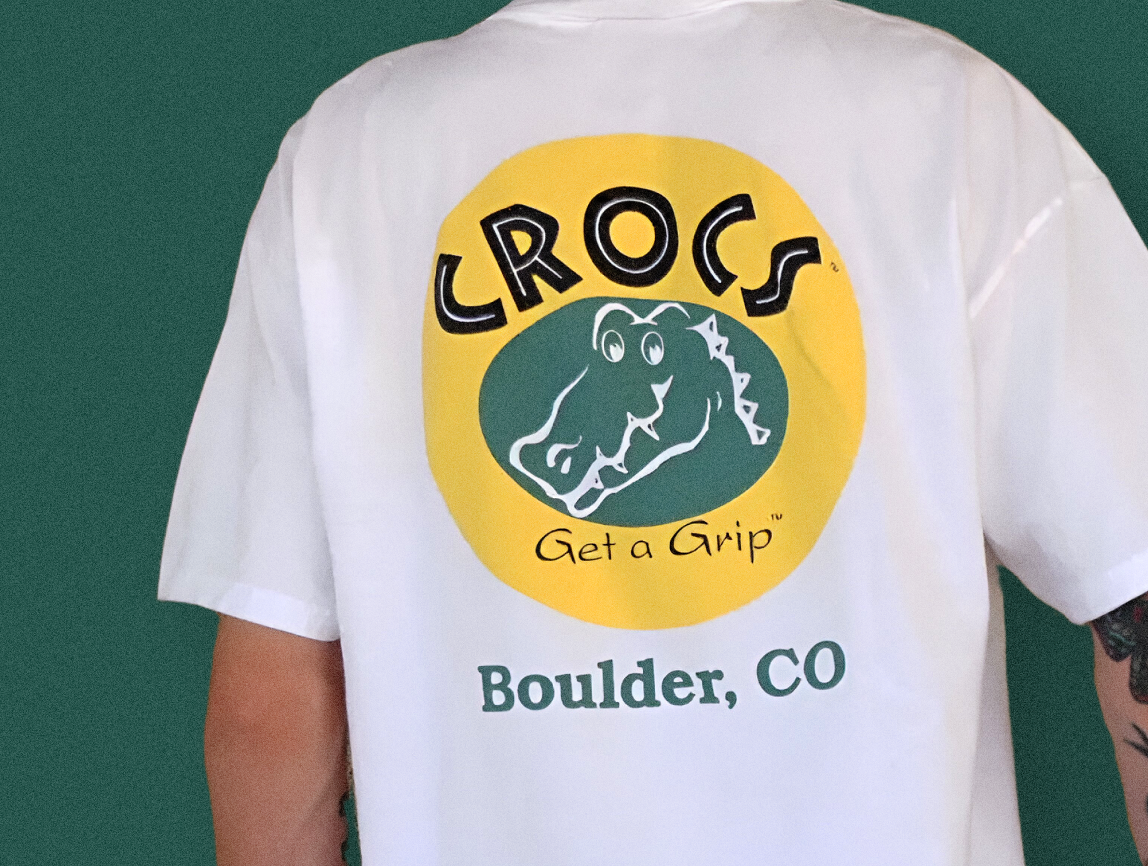 Crocs' early logo with the tagline “Get a Grip”