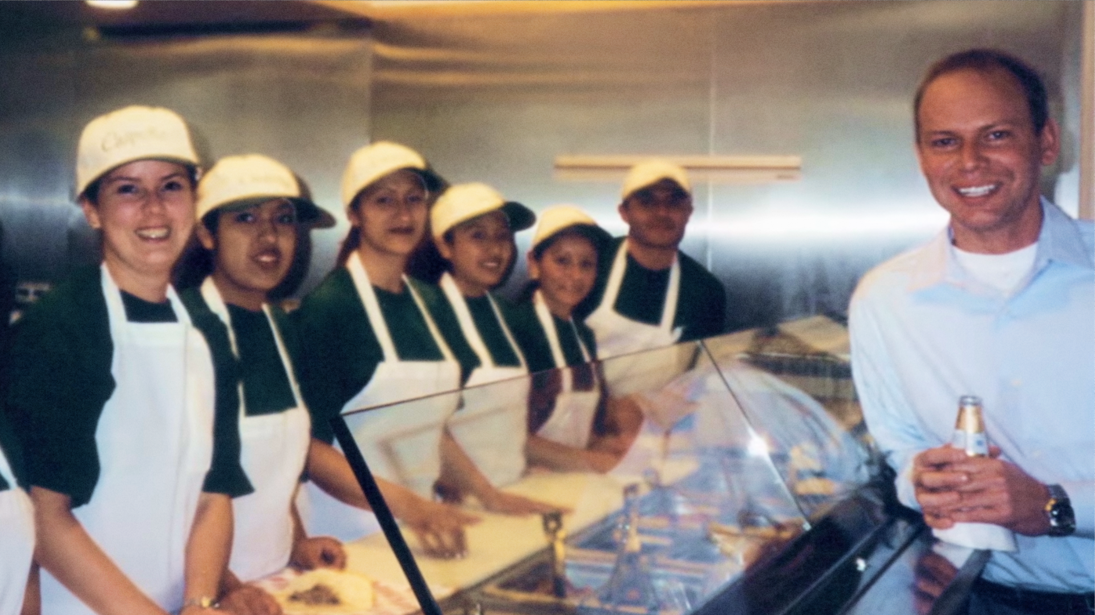 Steve Ells and a team at the assembly line in Chipotle's early days