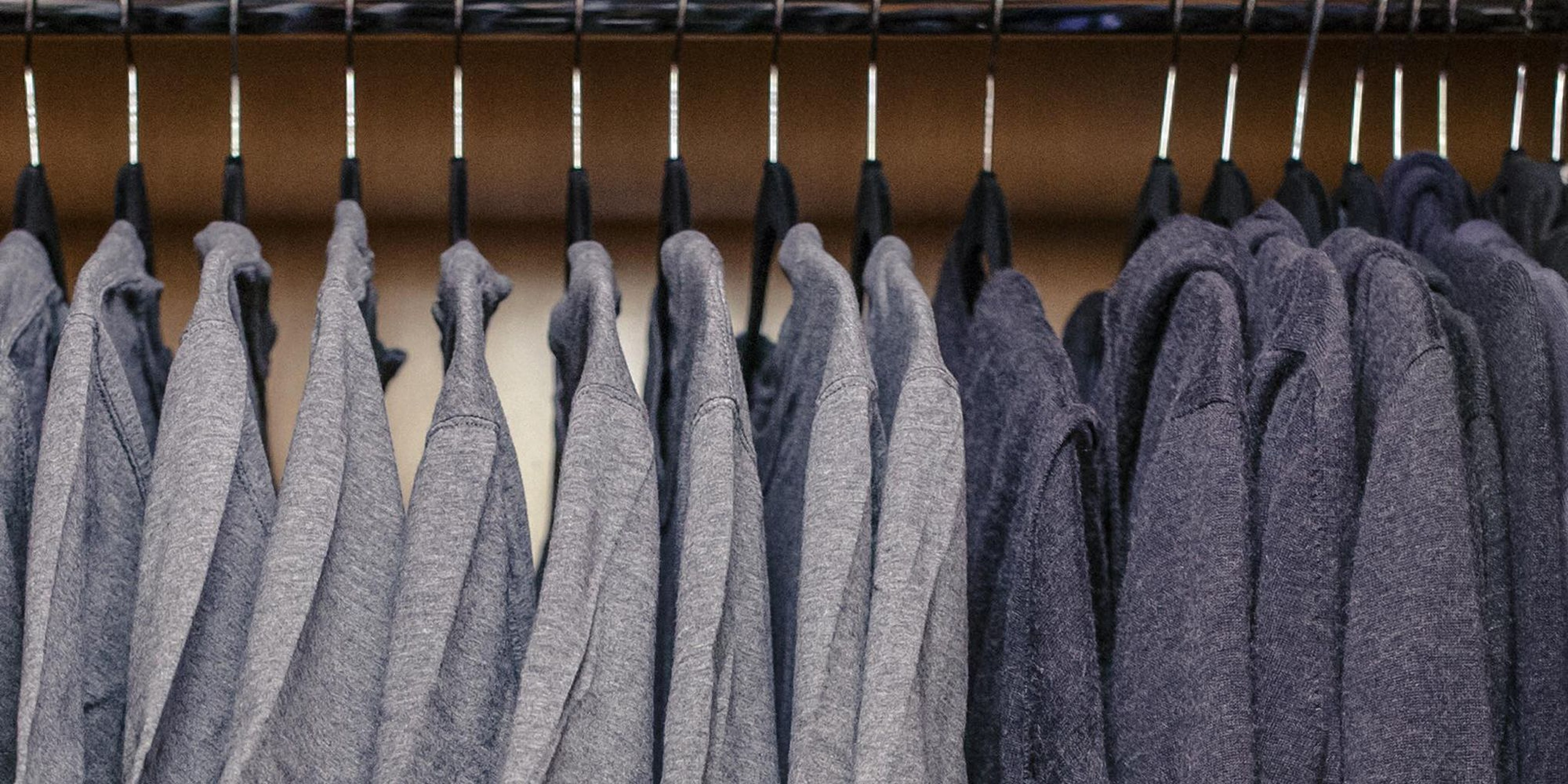 Row of hanging cashmere sweaters