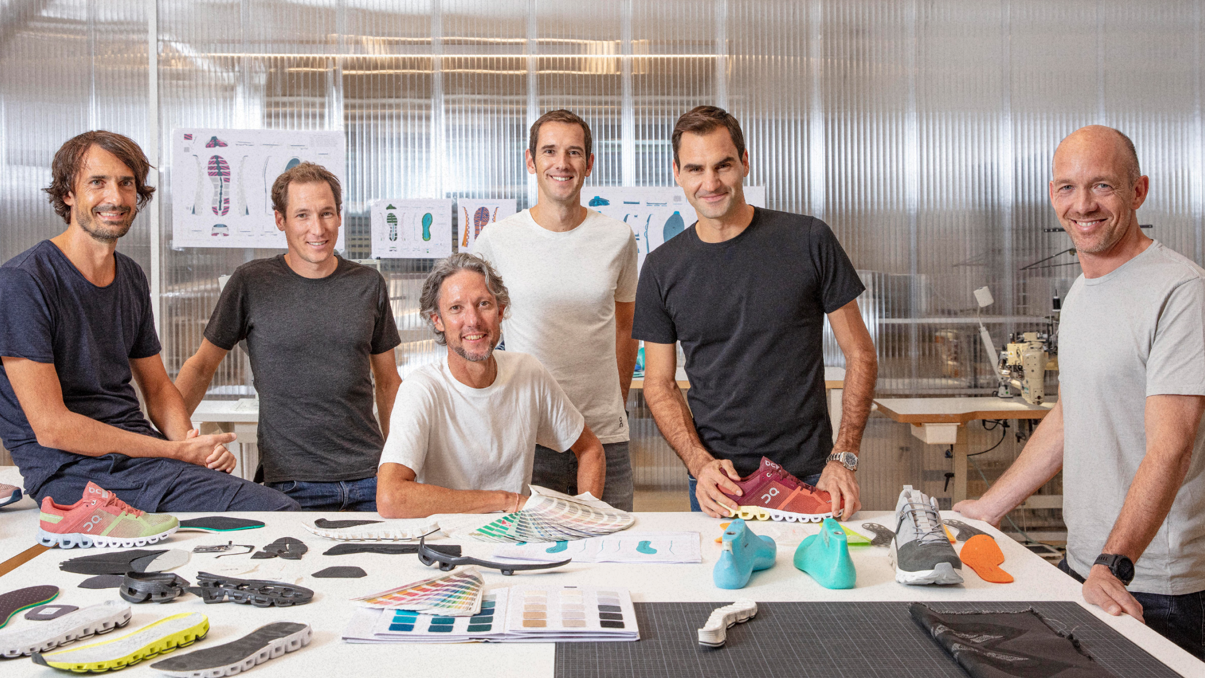 Coppetti, Maurer, Bernhard, Hoffmann, and Allemann, together with Roger Federer