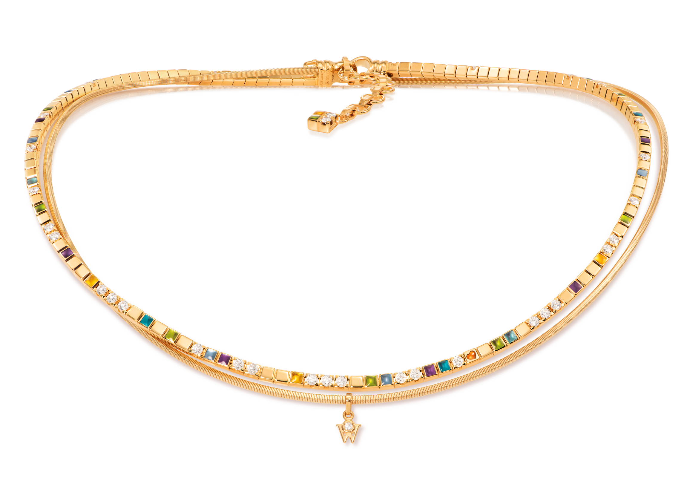 Das Collier POWER IN COLOUR aus 18 Karat Gelbgold begeistert mit Kaltemaille in acht Farben und einem kleinen orangefarbenen Herz. Collier auf hellem Hintergrund.
