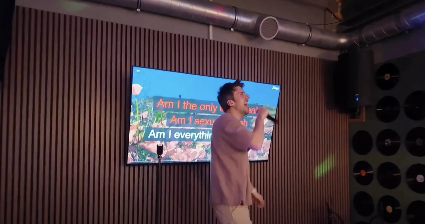 Someone singing karaoke in Funsports Area Troisdorf