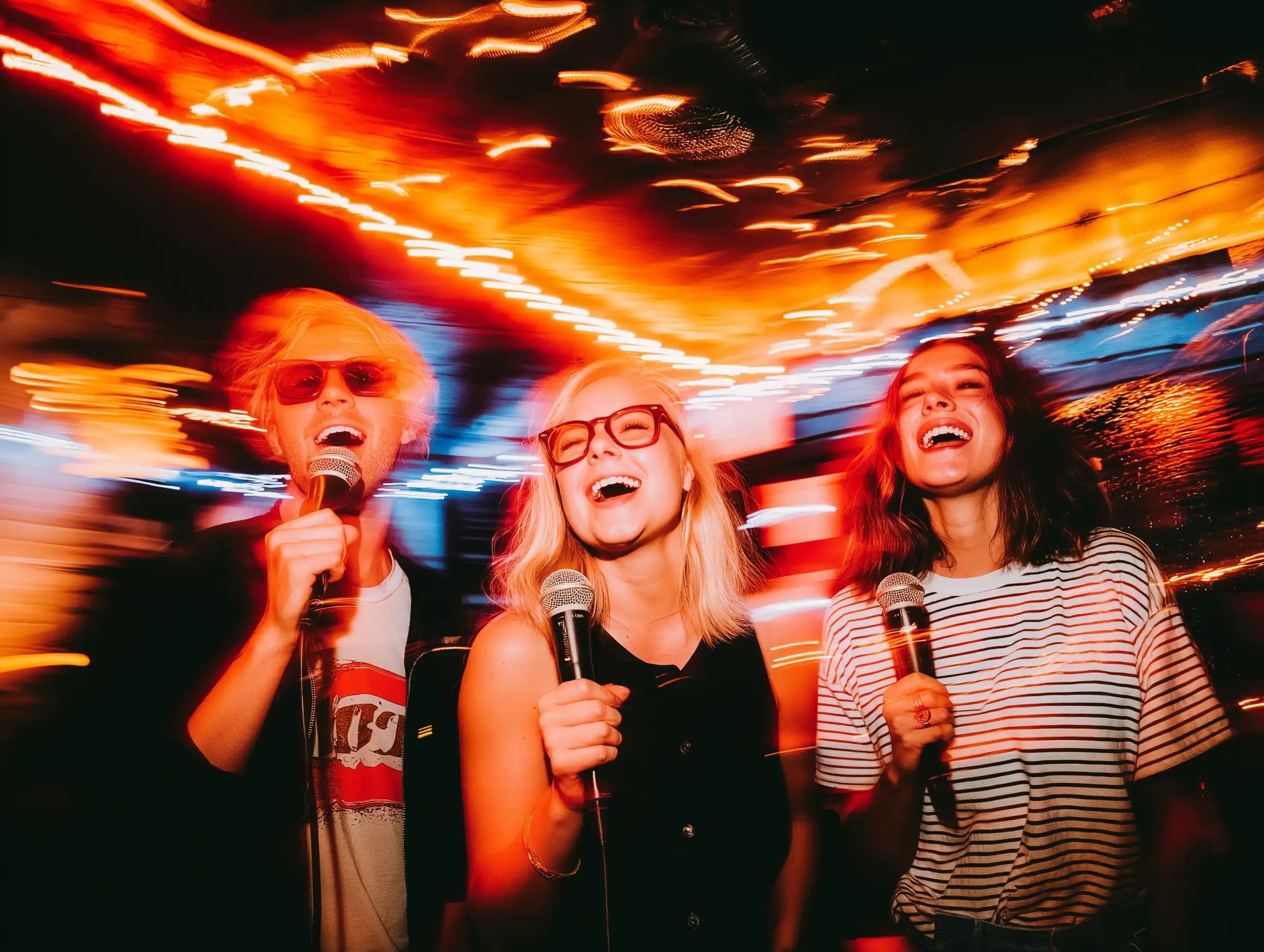 Friends singing karaoke together
