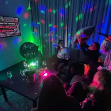 Group of singers in the karaoke room at Folks Hotel