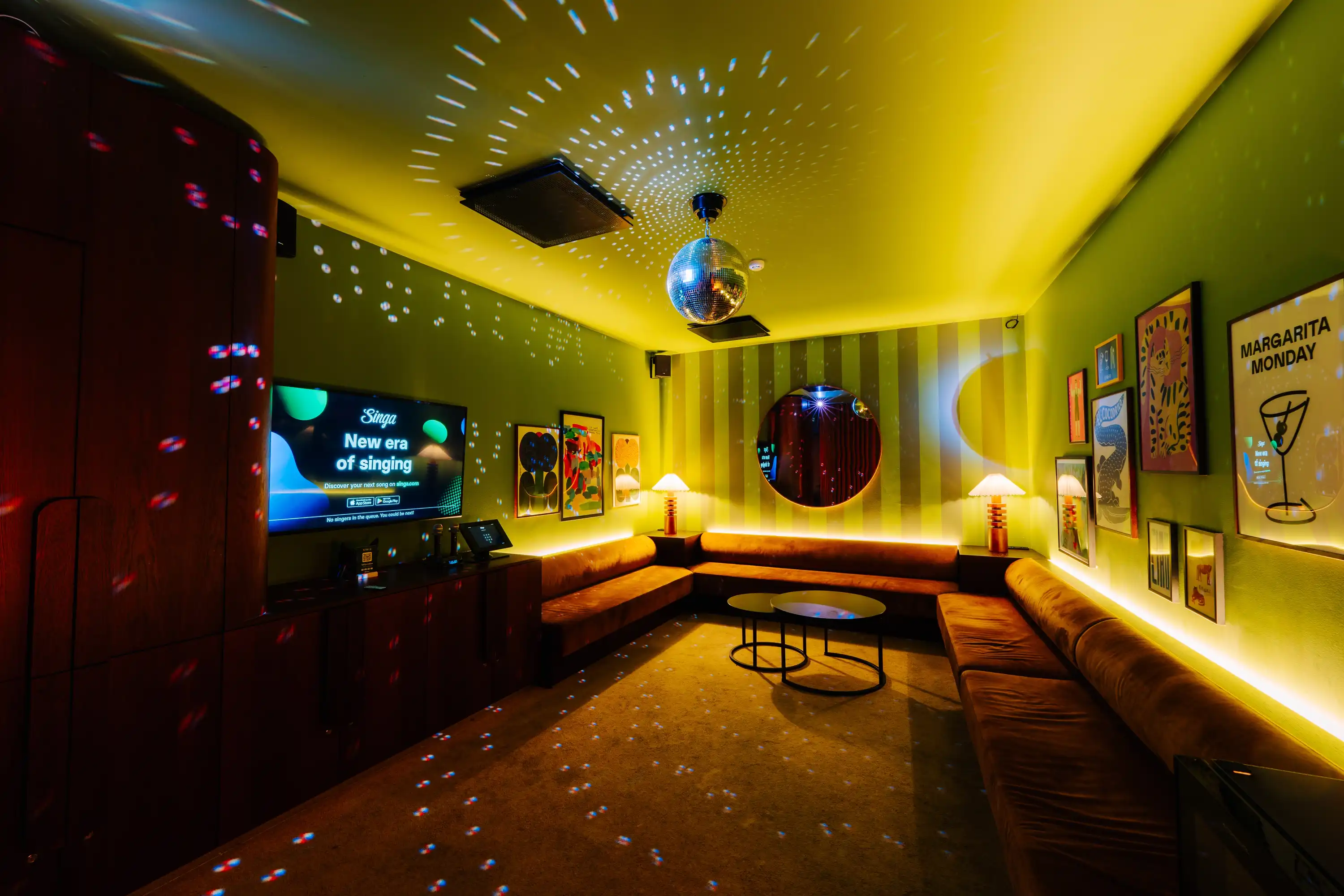 Guests singing in a private Singa karaoke room
