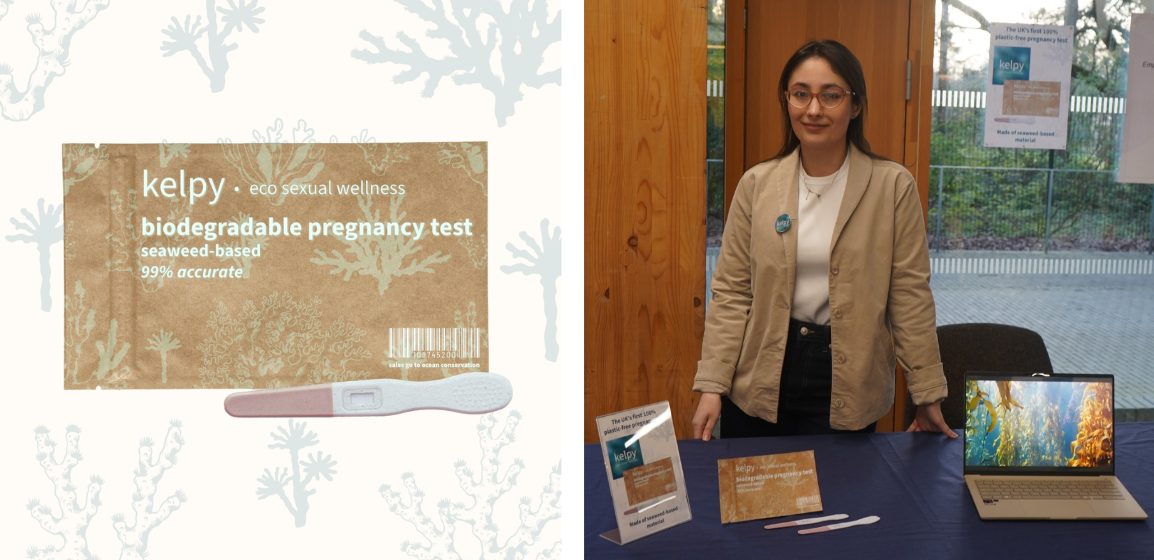 Woman at a booth presenting a biodegradable seaweed-based pregnancy test, with a display board and a laptop featuring related imagery.