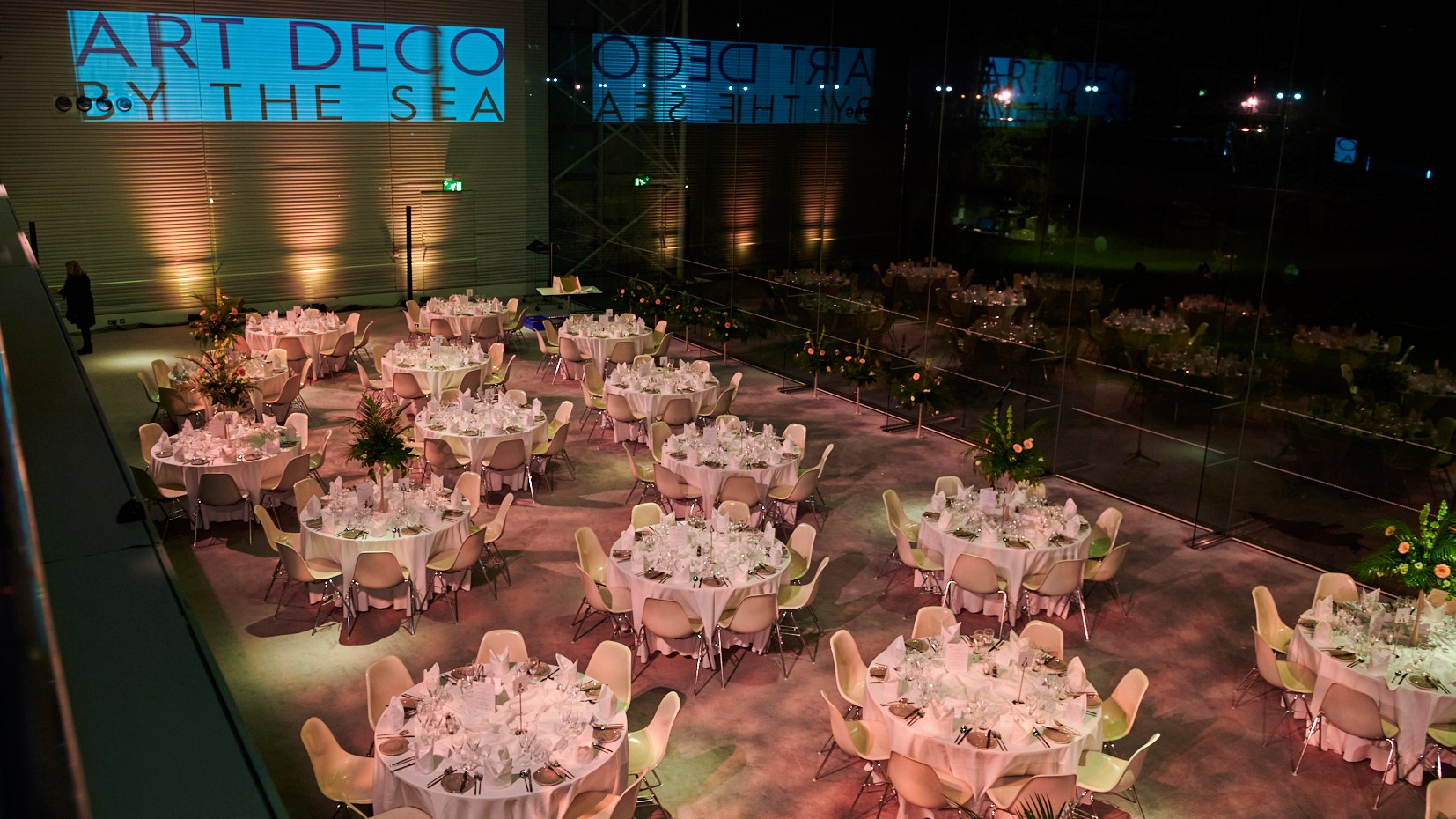 The Modern Life cafe full of tables set for a dinner