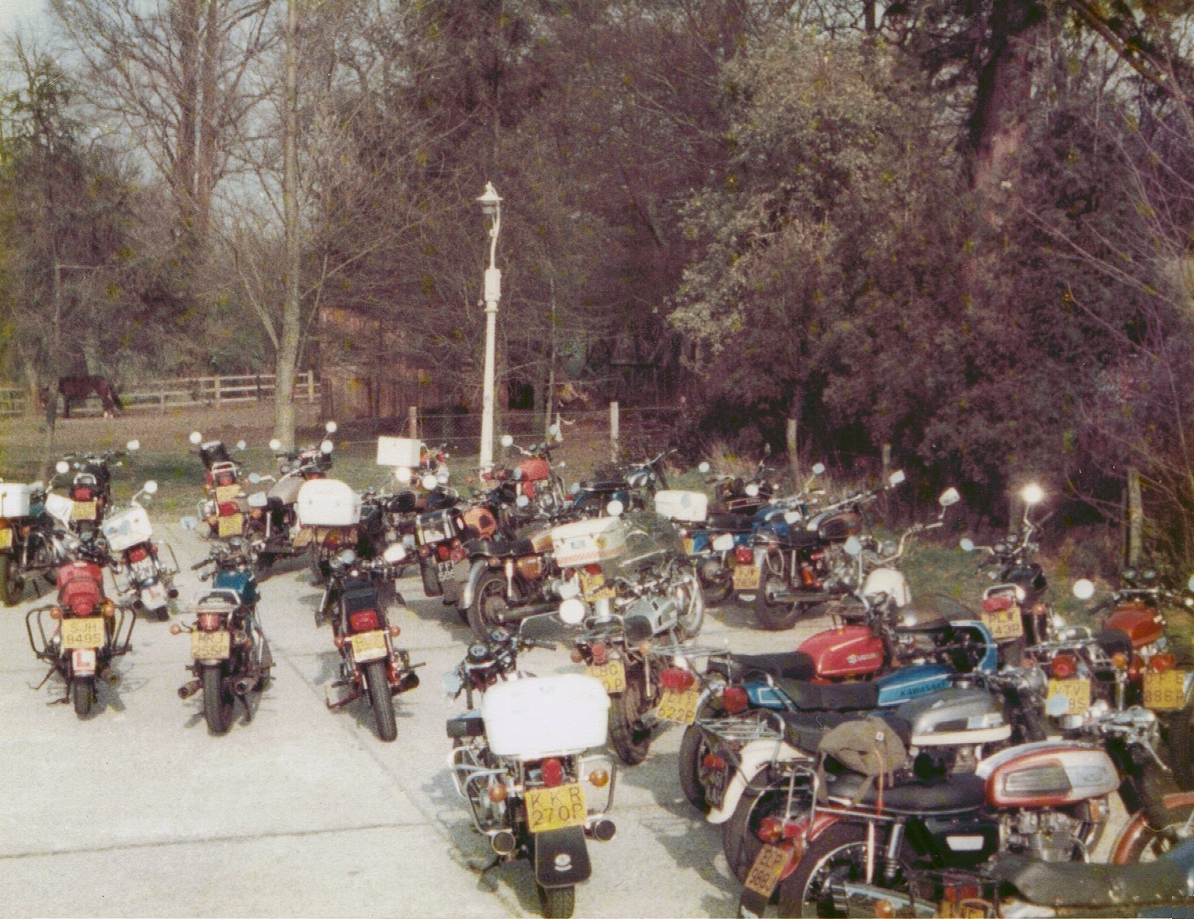 A group of motorcycles out in UEA village