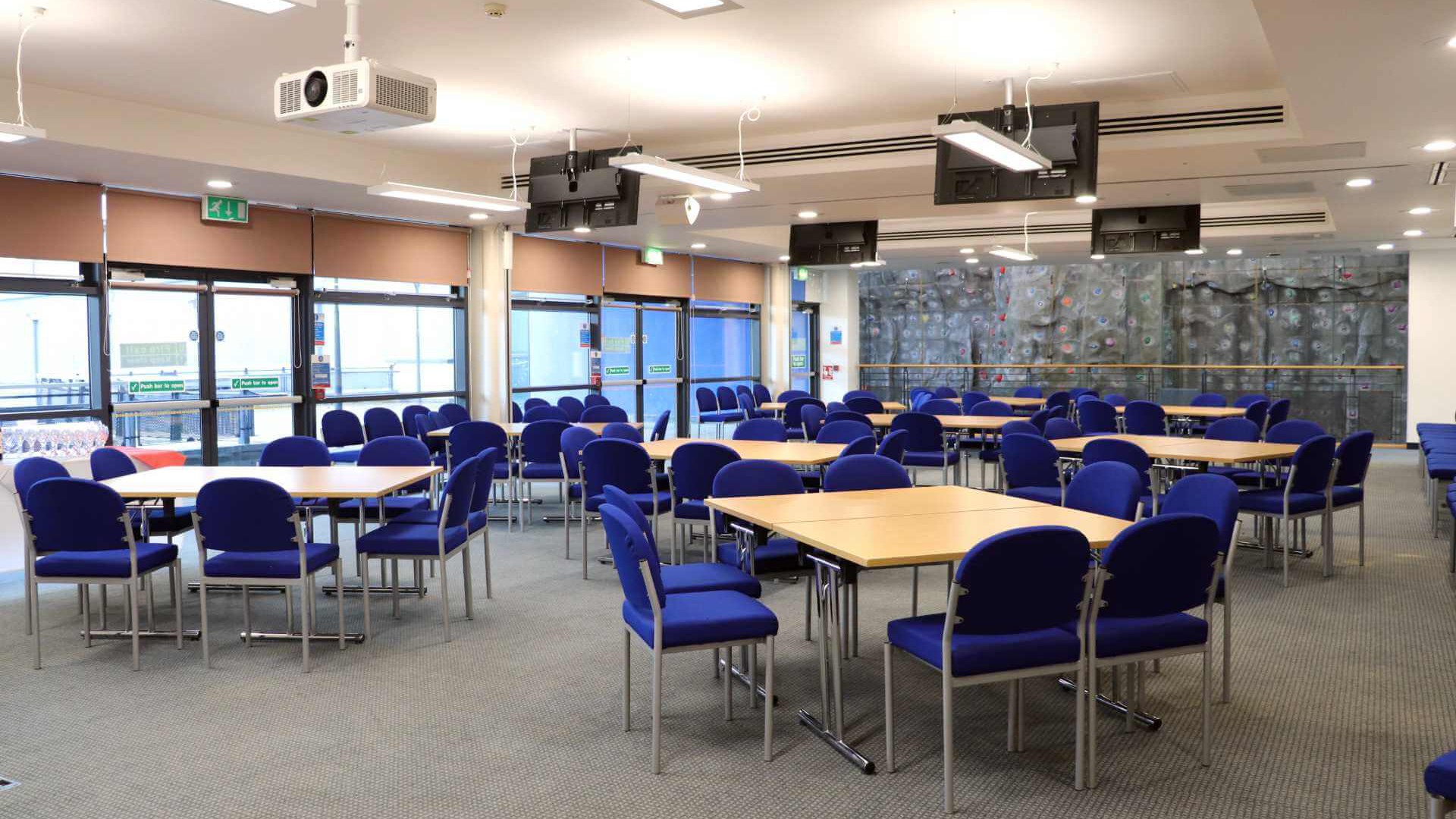 A Sportspark conference room overlooking a climbing wall