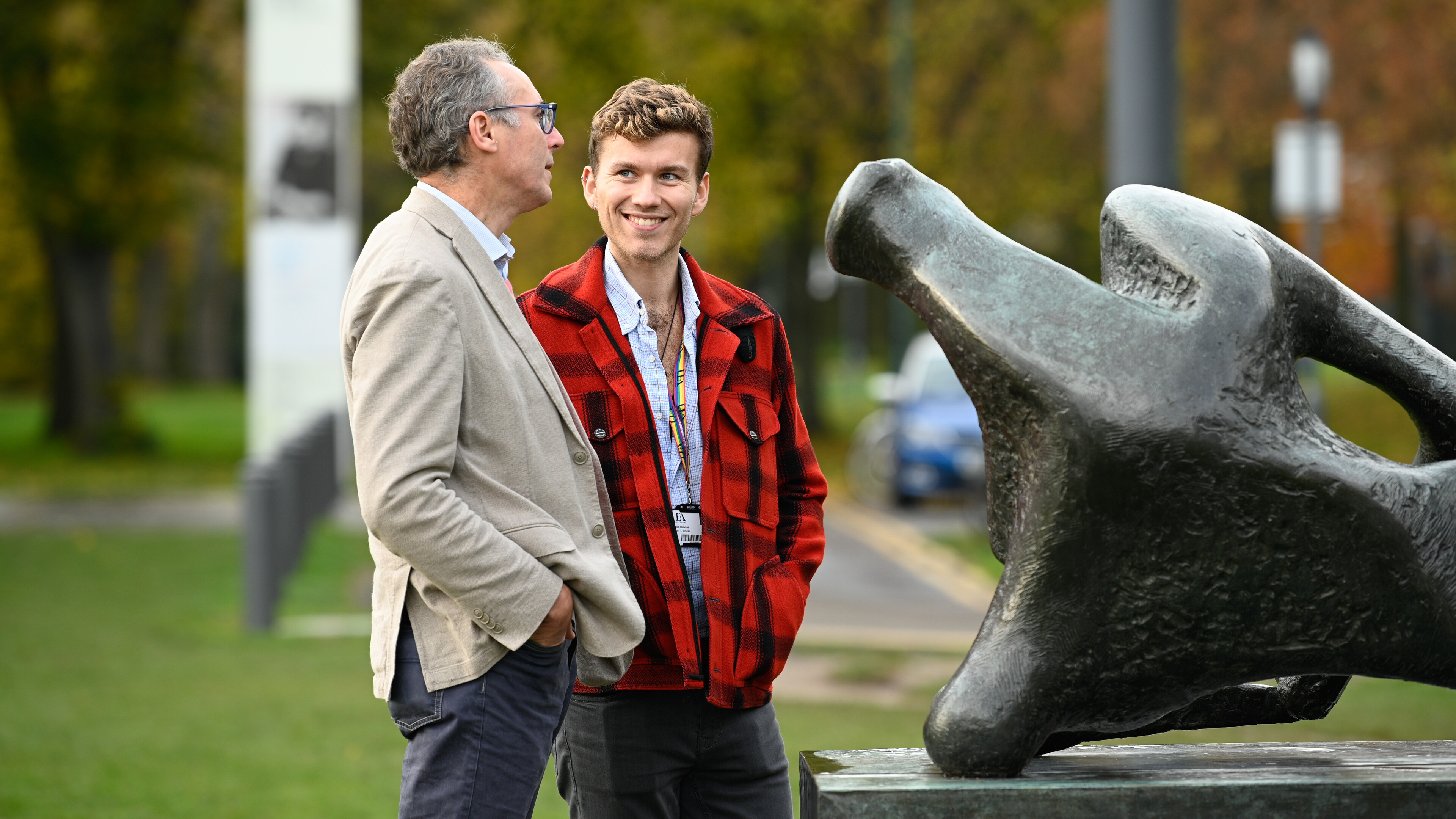 Colleagues with sculpture