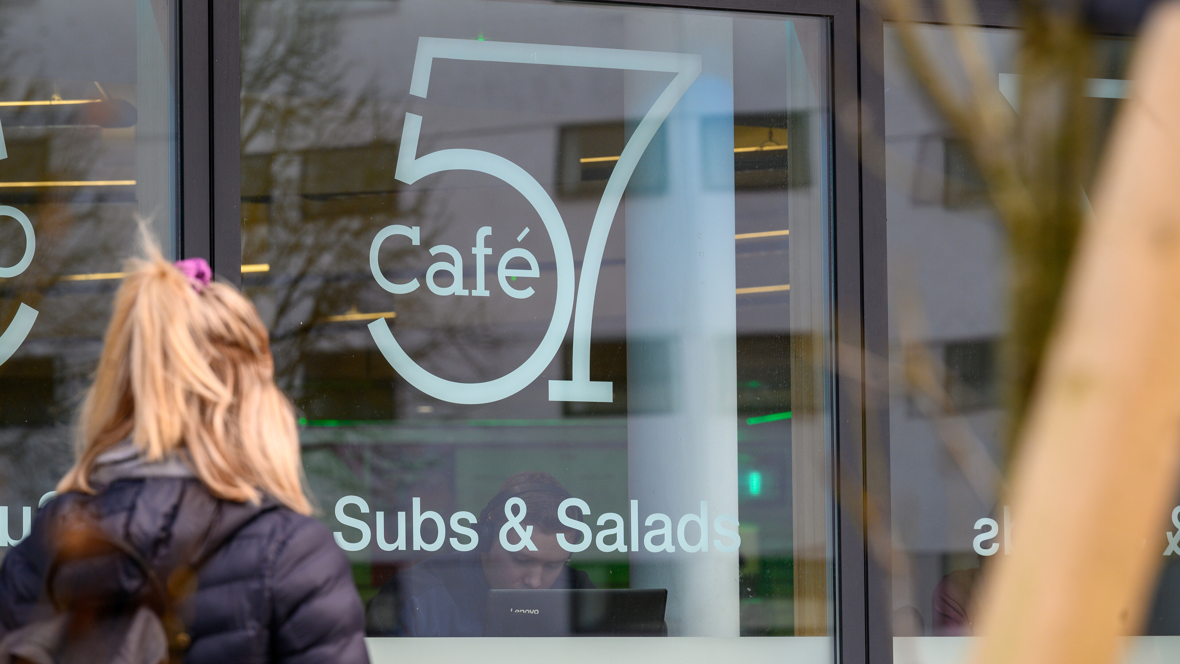Student outside Cafe 57