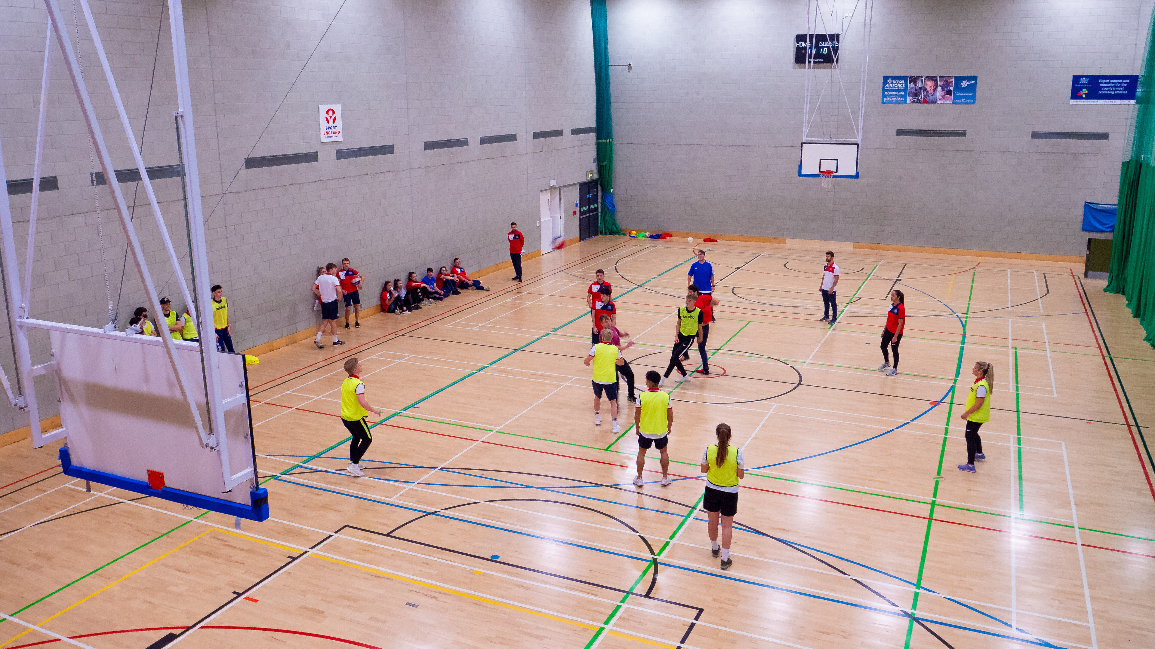 Students playing basketball at Sportspark courts