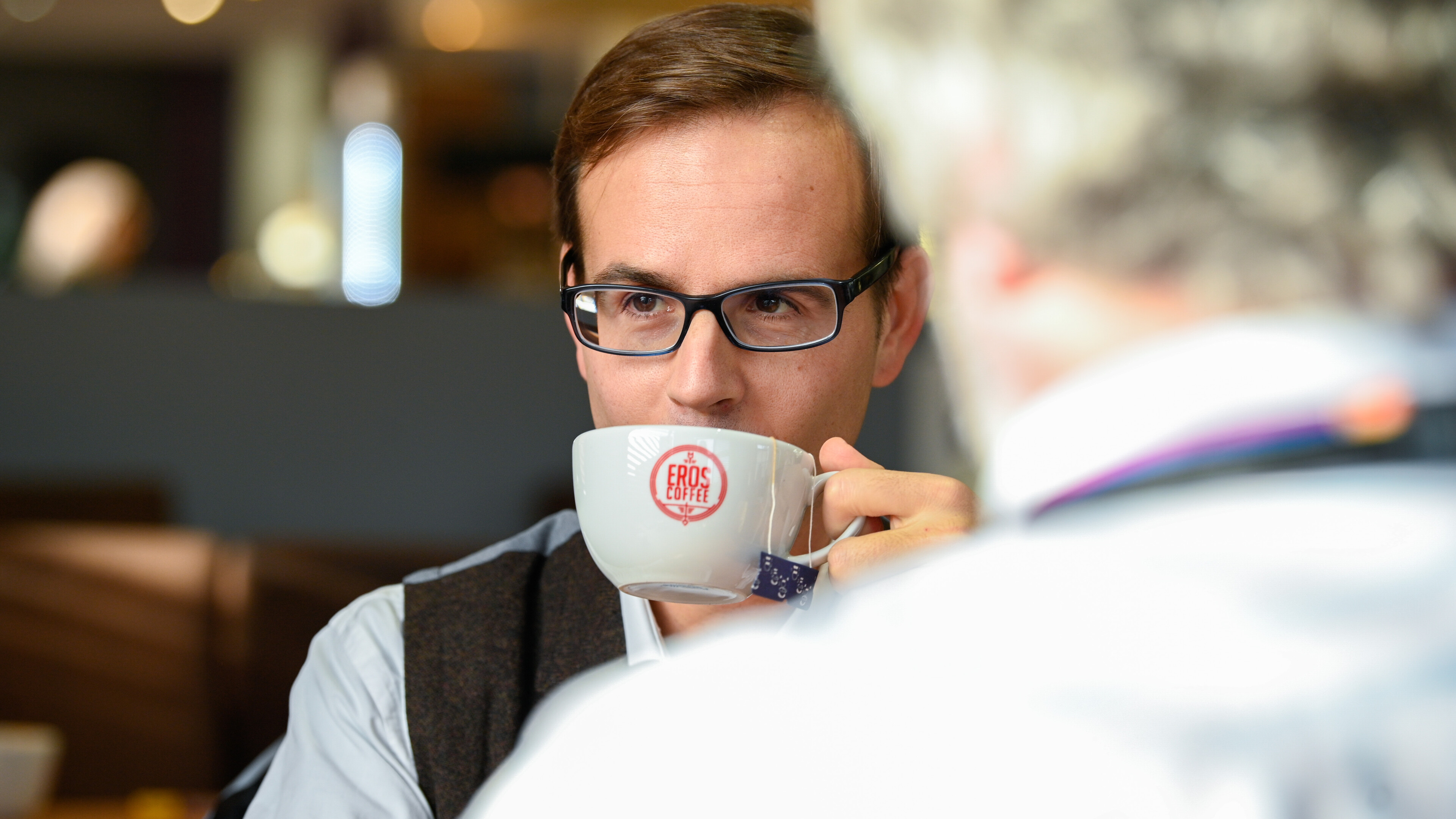 Staff drinking coffee at Vista