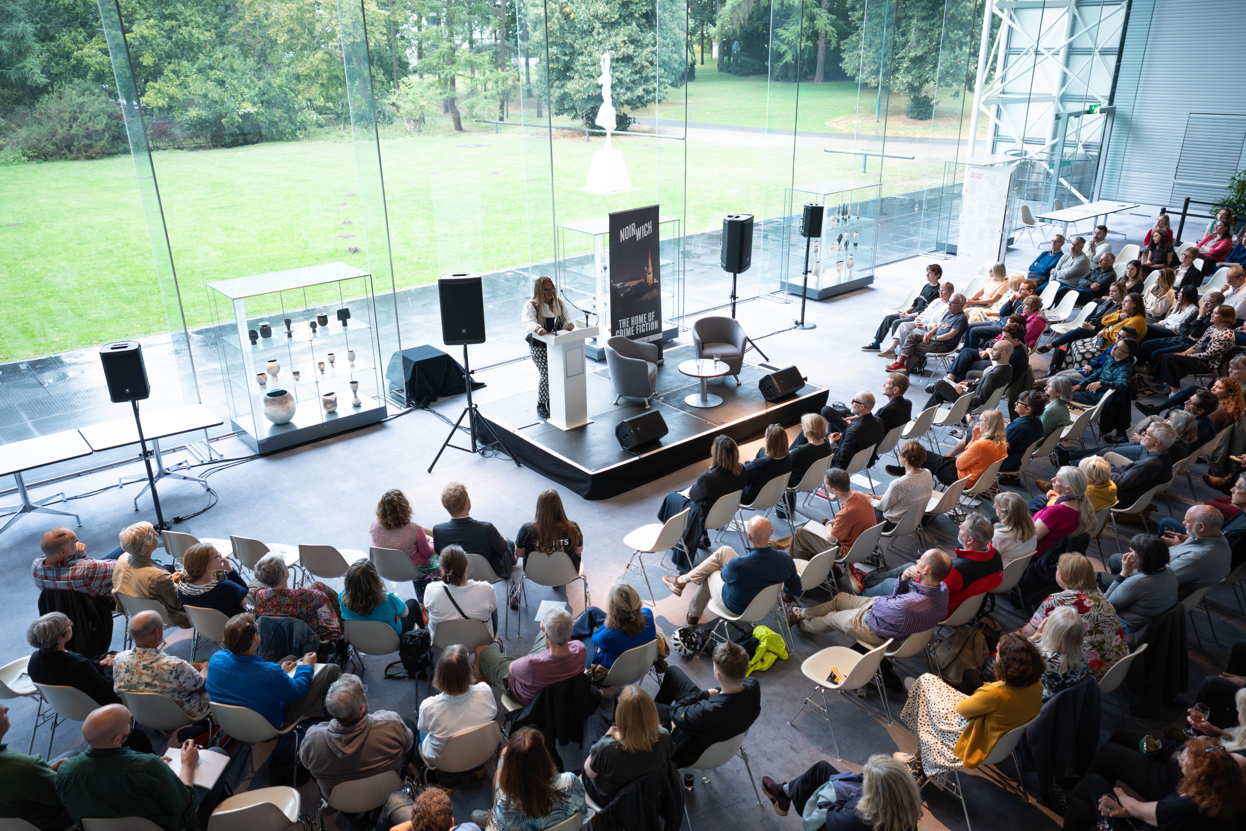Oyinkan Braithwaite addressing the audience at a Noirwich event in the Sainsbury Centre.