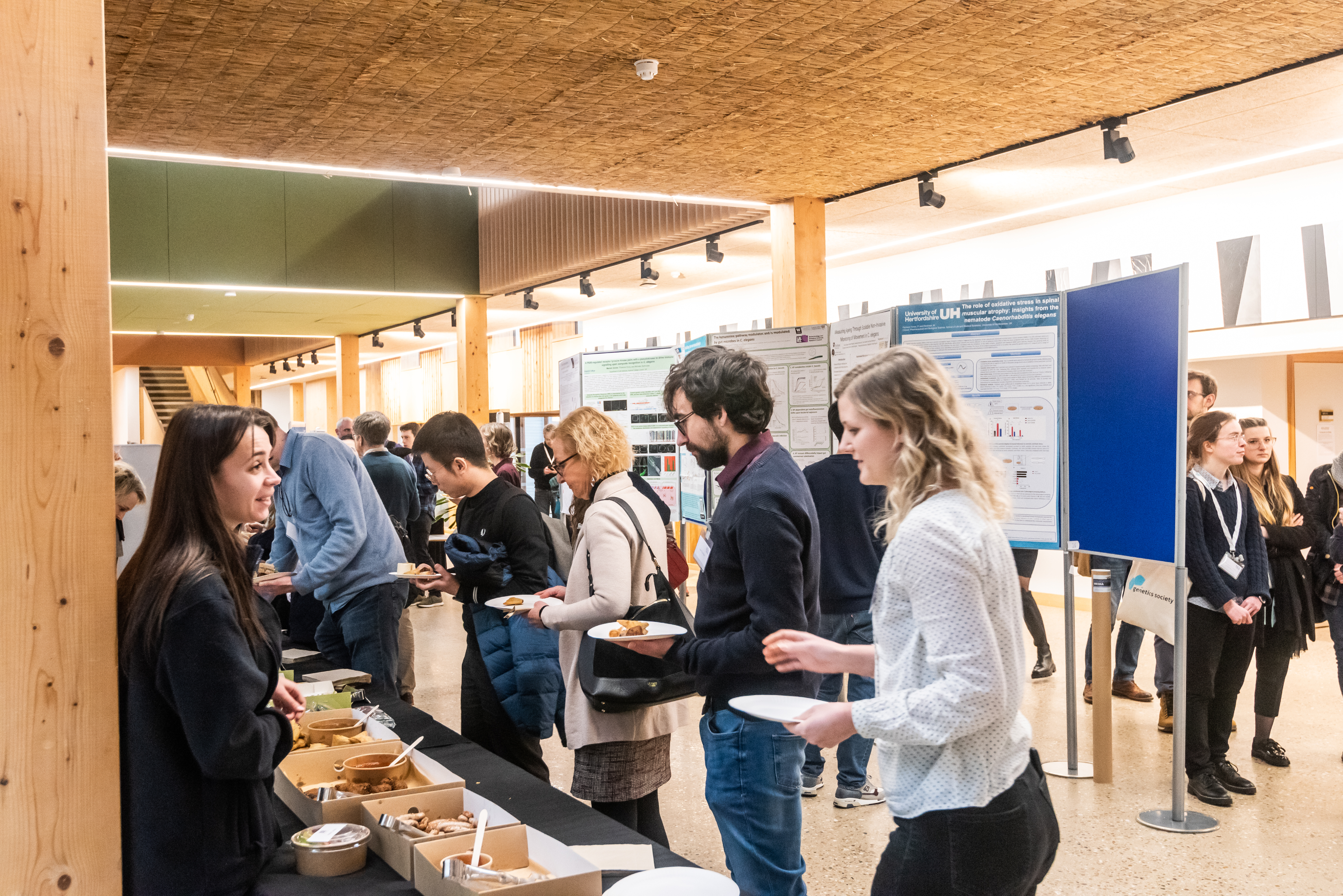 Delegates eating at a conference.