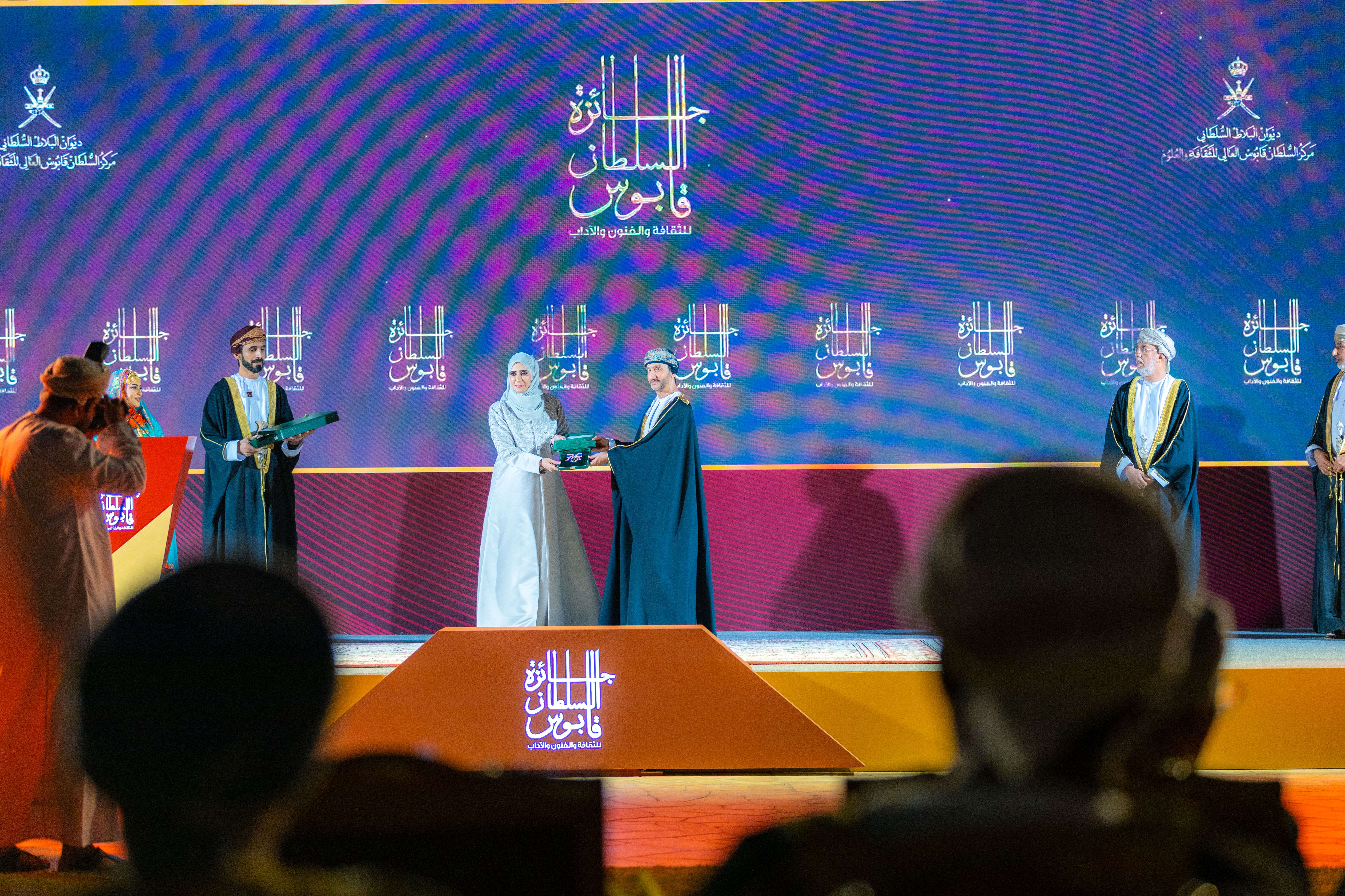 Shamisa Alnuumani receiving the 11th Sultan Qaboos Award for Culture, Arts and Literature, in the field of Classical Arabic Poetry, at an awards ceremony