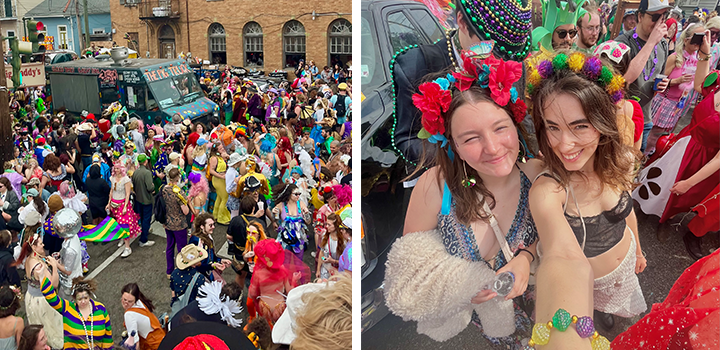 A lively street festival with colorful costumes; two women smiling in the foreground, wearing vibrant floral headpieces