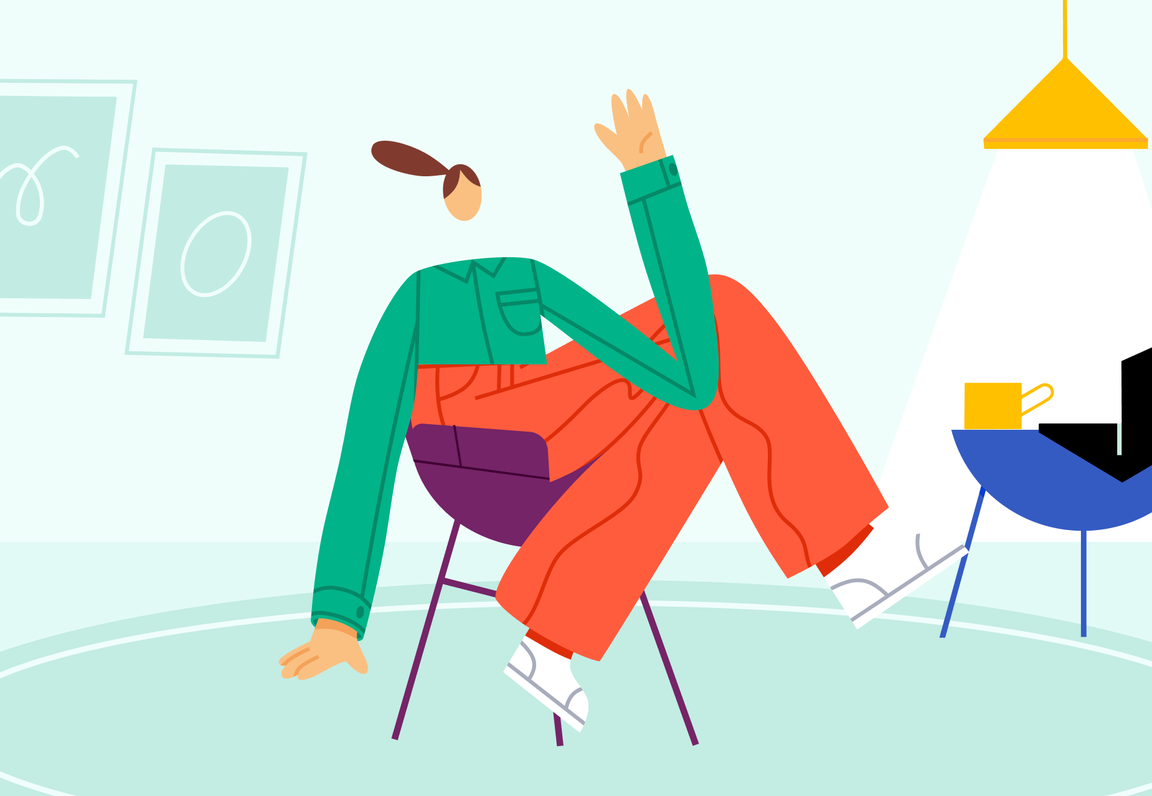 Person sitting in a chair waving during a video call