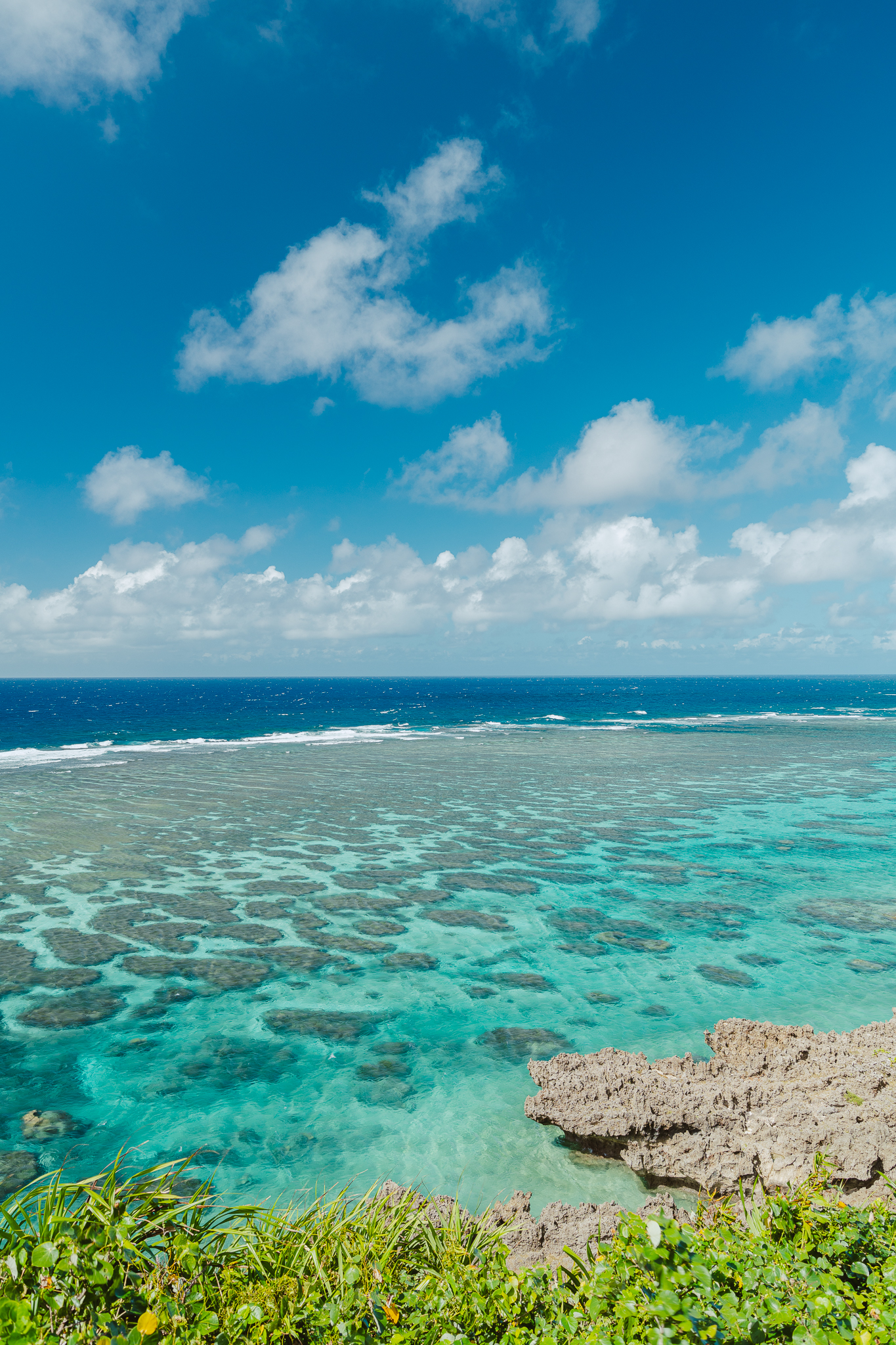 Crystalline turquoise sea with corals from observatory deck