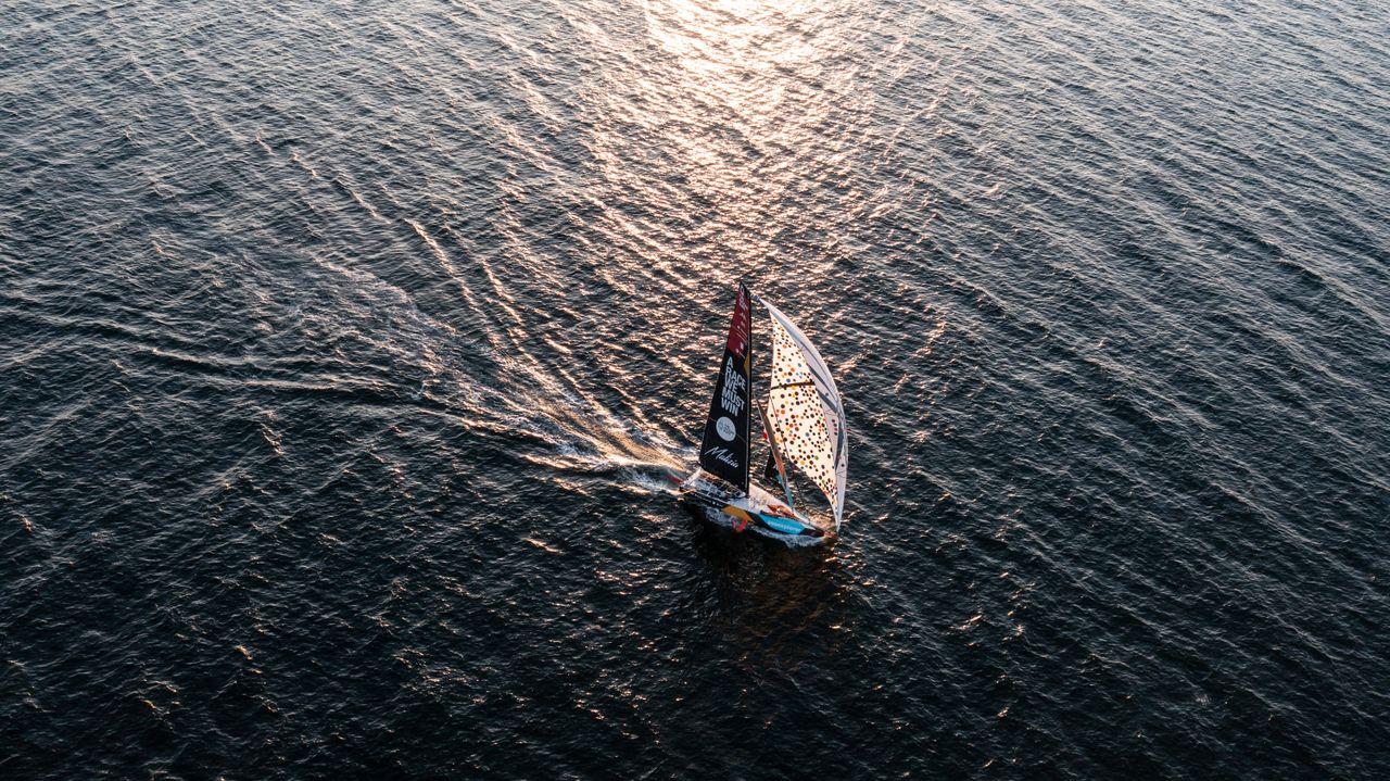 Malizia - Seaexplorer sailing her hoisted spinnaker designed by artist Sarah Morris