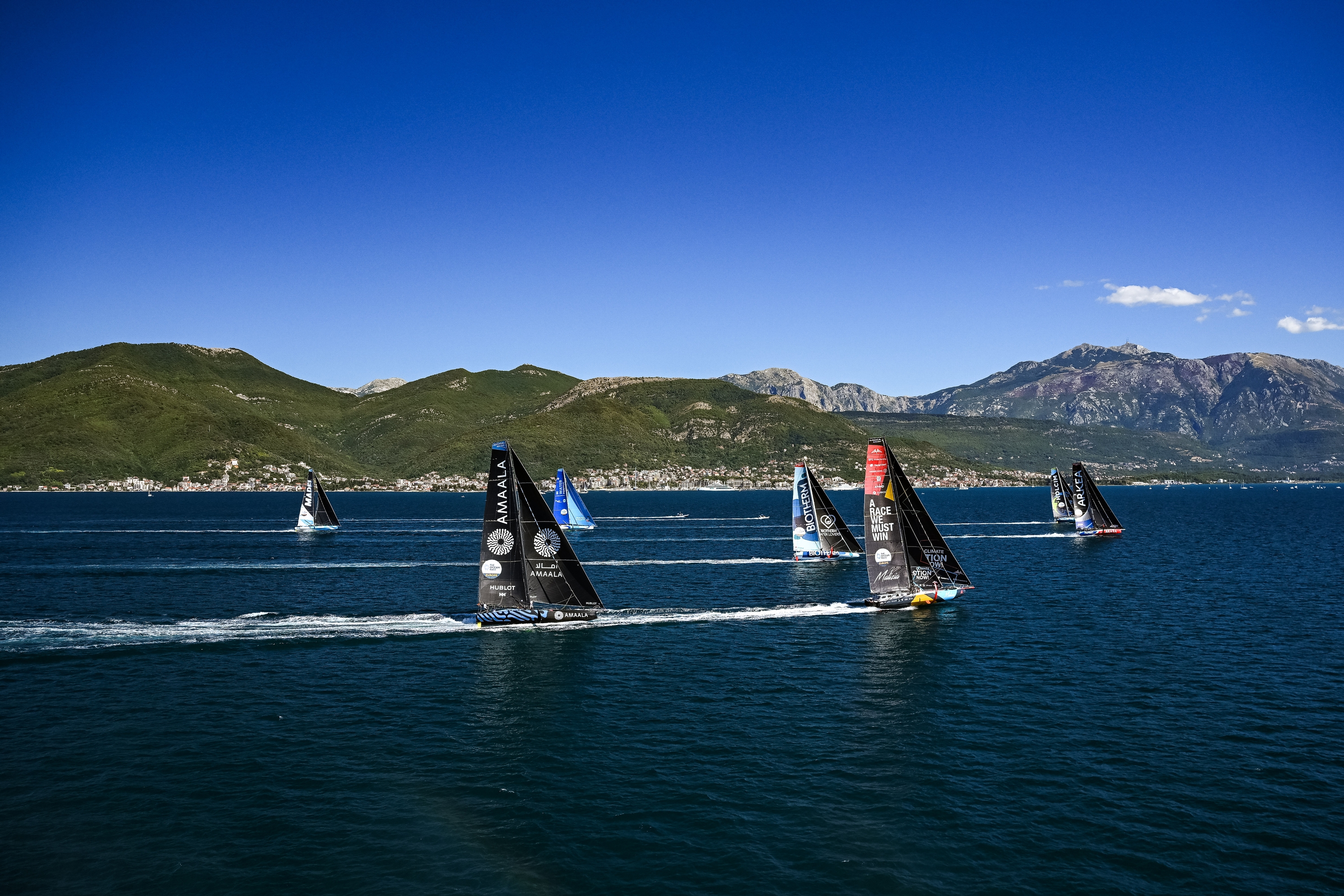 The IMOCA fleet racing in Boka Bay
