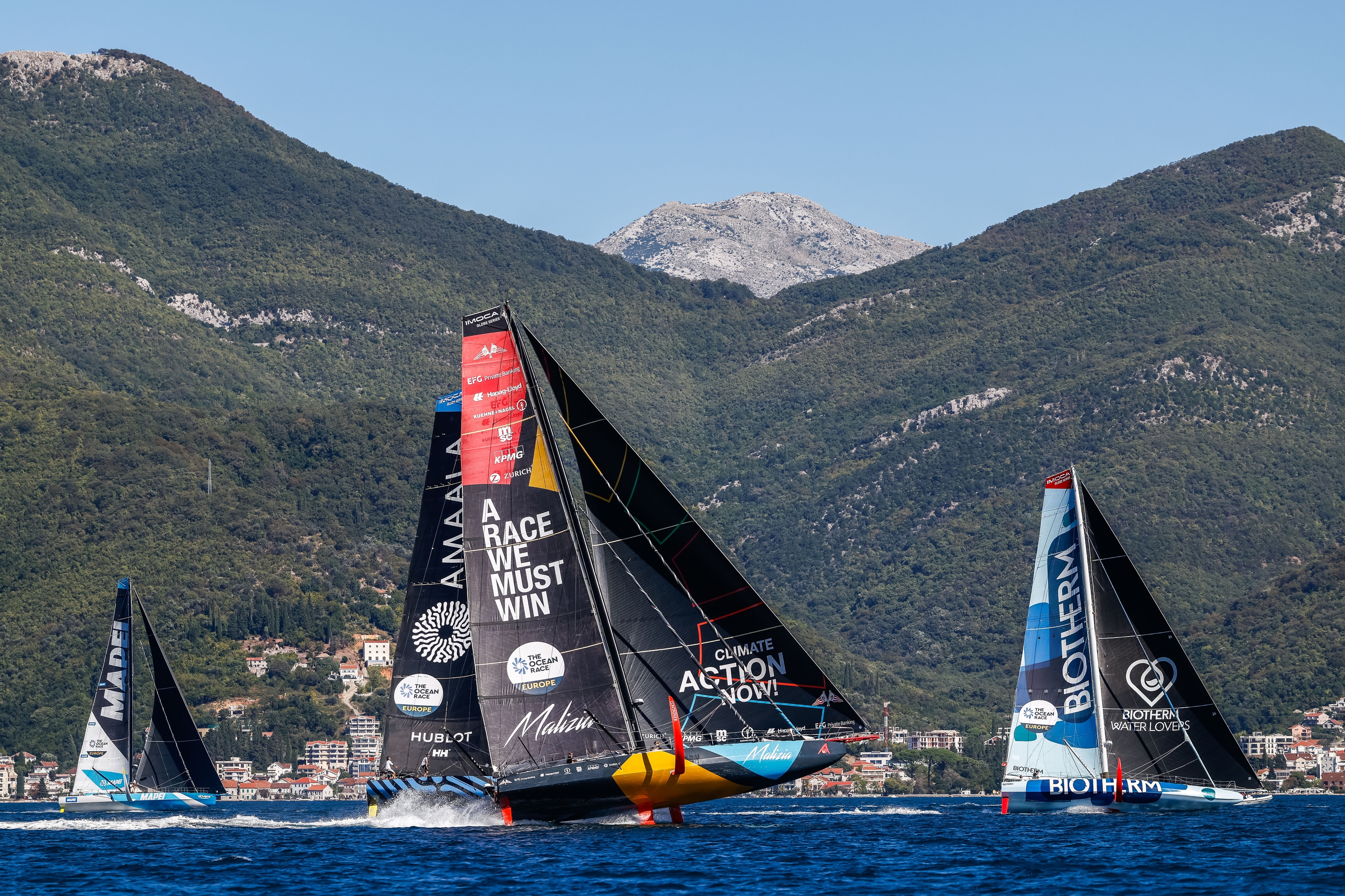 The team racing one more time onboard their IMOCA yacht under the Malizia colours in Boka Bay, Montenegro