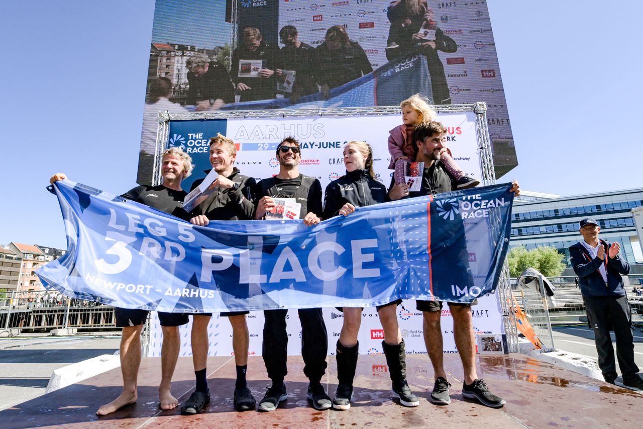 From left to right: Yann Eliès, Will Harris, Antoine Auriol, Rosalin Kuiper, and Boris Herrmann celebrating third place and a world record in Aarhus