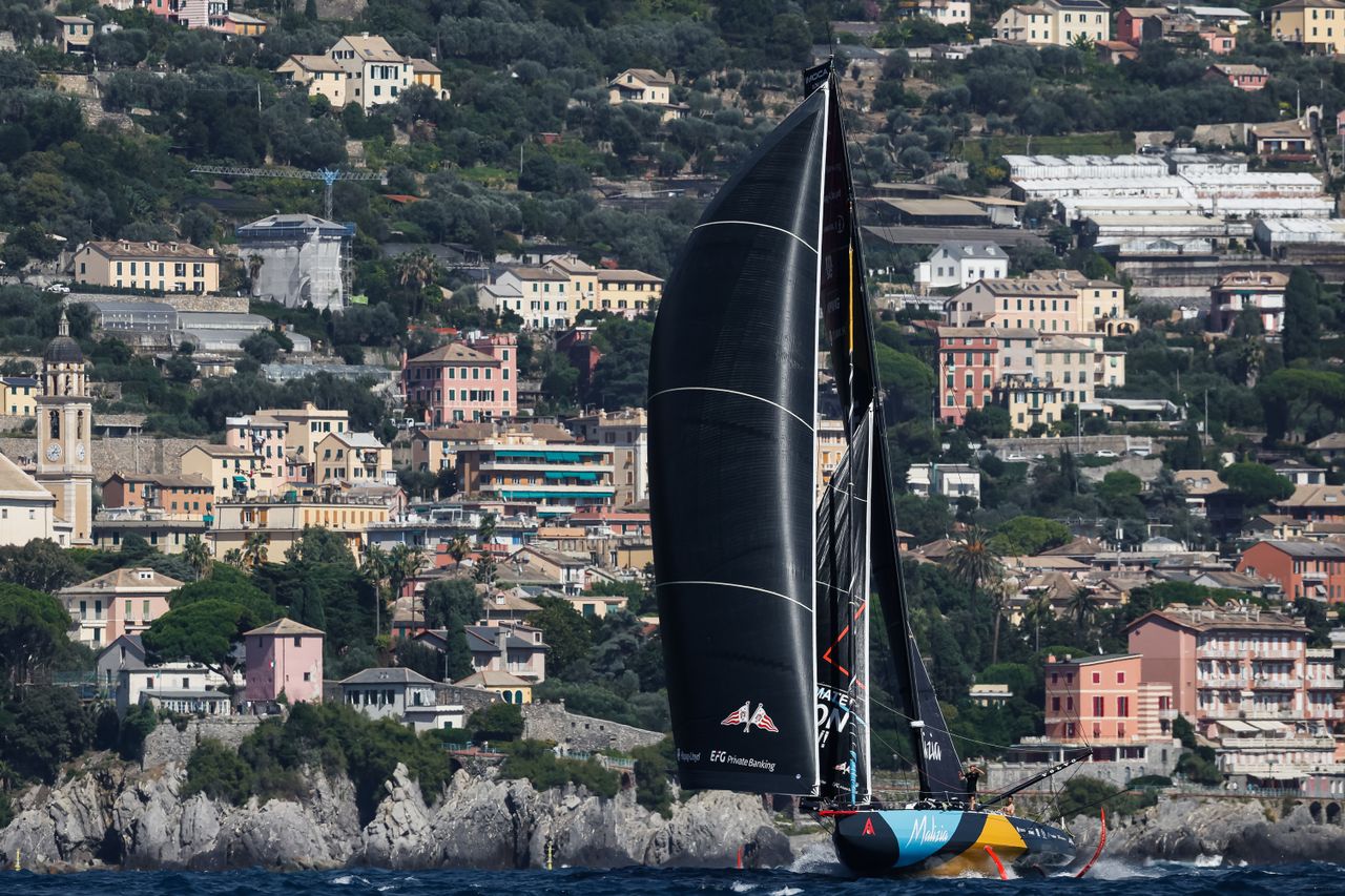 Malizia Explorer in front of the coast of Genova, Italy