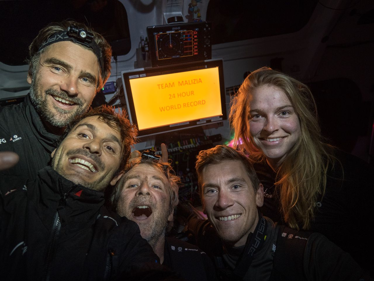 Team Malizia's crew have set a new world record, from left to right: Boris Herrmann, Antoine Auriol, Yann Eliès, Will Harris, and Rosalin Kuiper