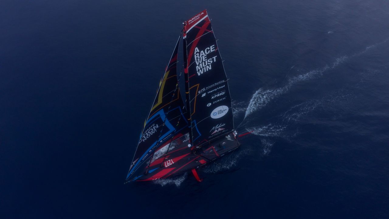 Malizia 4 sailing in the fog in the middle of the Atlantic Ocean