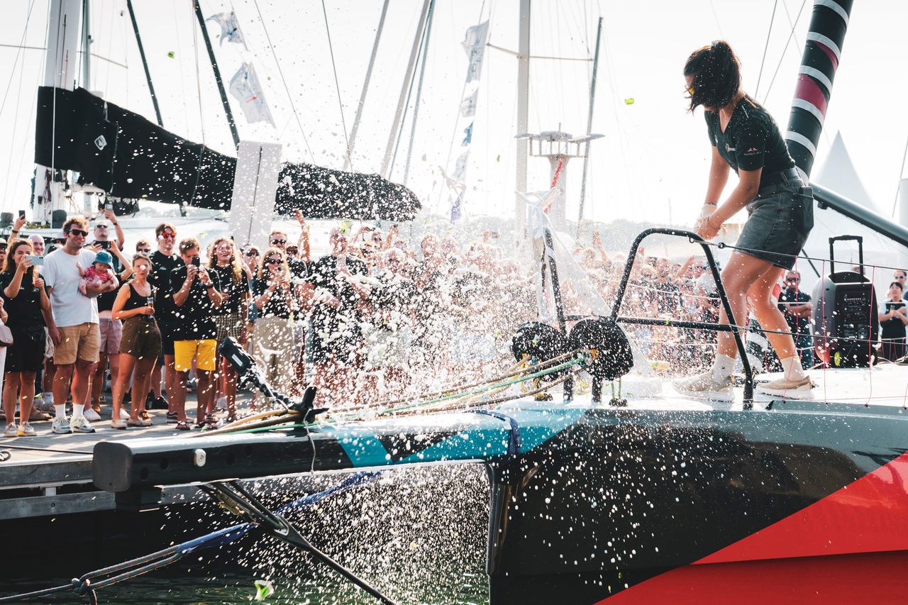 Cole Brauer smashed the bottle on the anker of the boat, successfully christening Malizia 4