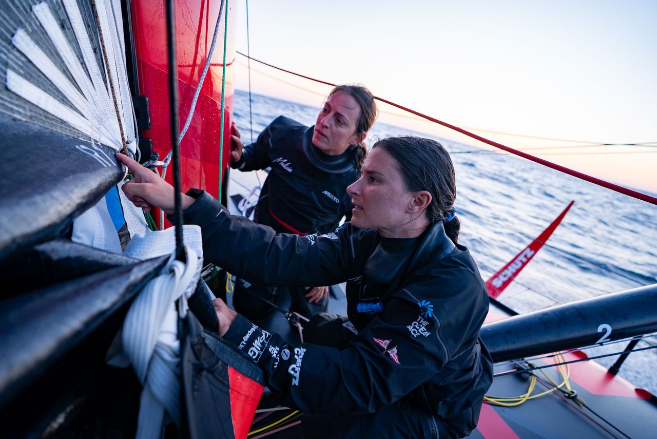 Co-skippers Justine Mettraux (left) and Cole Brauer (right) onboard Malizia 4