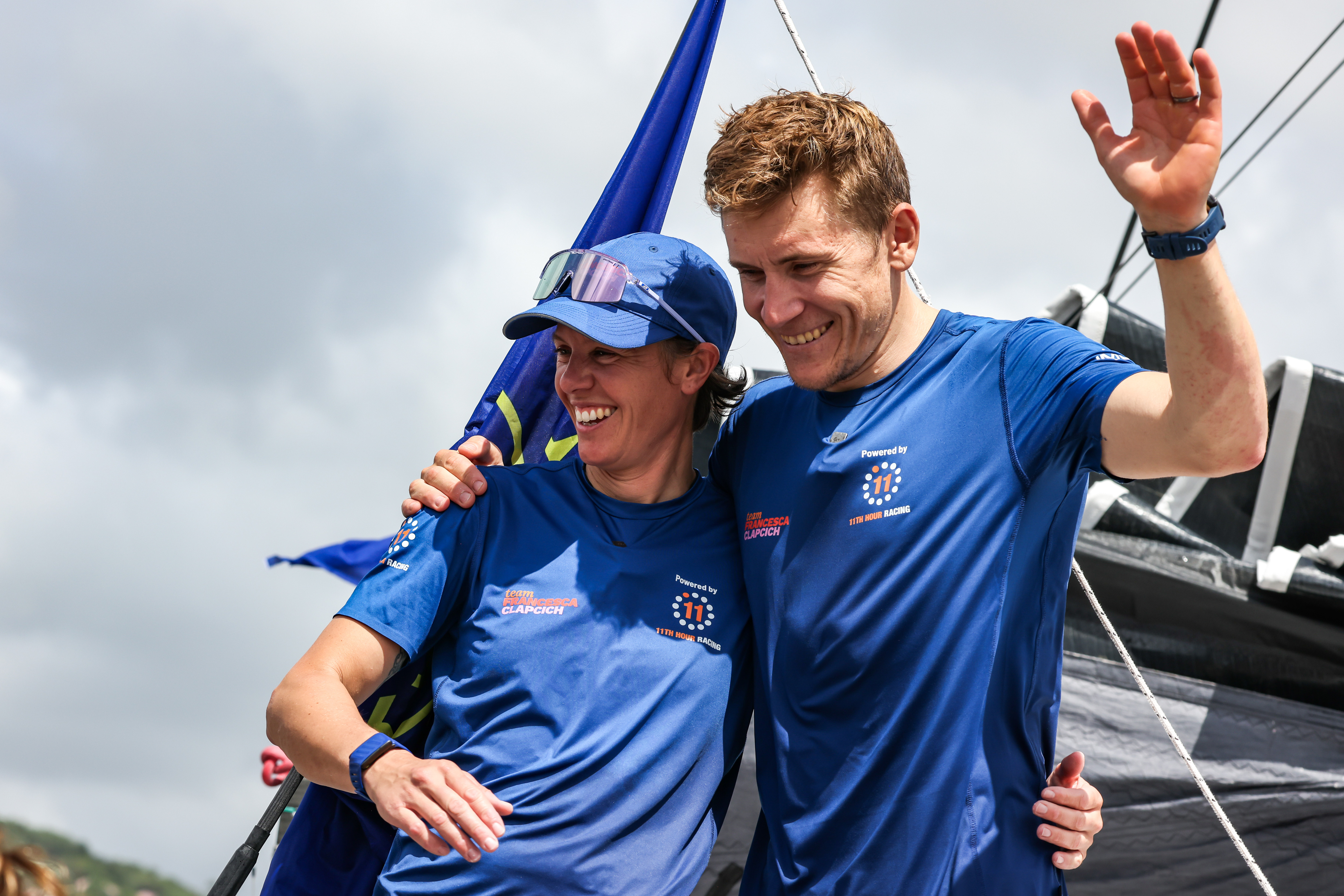 FORT-DE-FRANCE, MARTINIQUE : IMOCA 11th Hour Racing, skippers Francesca Clapcich and Will Harris celebrate after taking second place in their category of the Transat Café l'OR 2025 on November 7, 2025 in Fort-de-France, Martinique