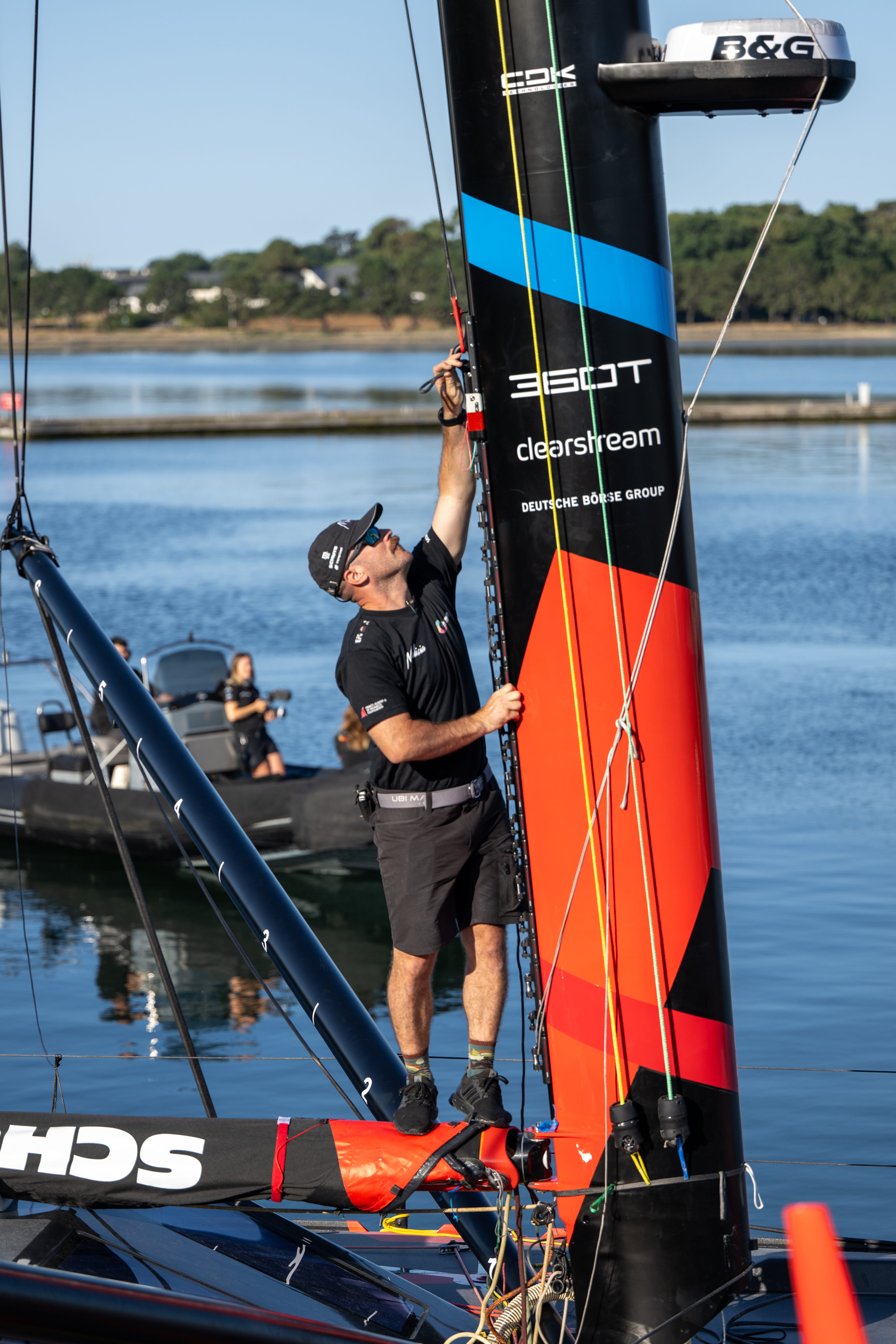 Team Malizia's shore crew preparing the newly launched Malizia 4 for a stability test the day after her launch