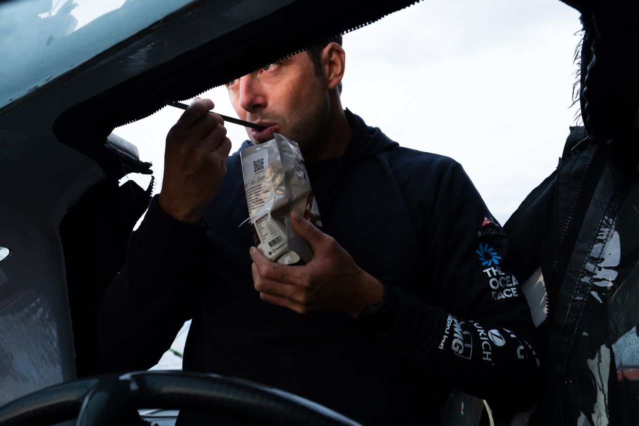 Julien Villion onboard Malizia 4 eating his breakfast