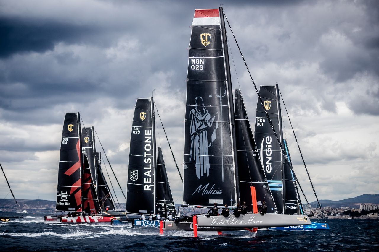 Team Malizia competing in the GC32 Racing Tour on their Malizia 1, a foiling catamaran that the crew, helmed by Pierre Casiraghi,  raced on for two seasons in 2016 and 2017