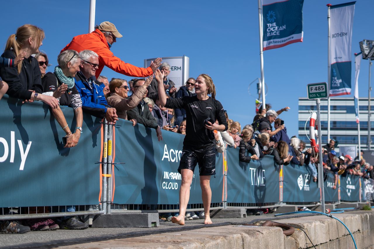 After being thrown in the water by Boris, co-skipper Rosalin greets the Aarhus crowds.