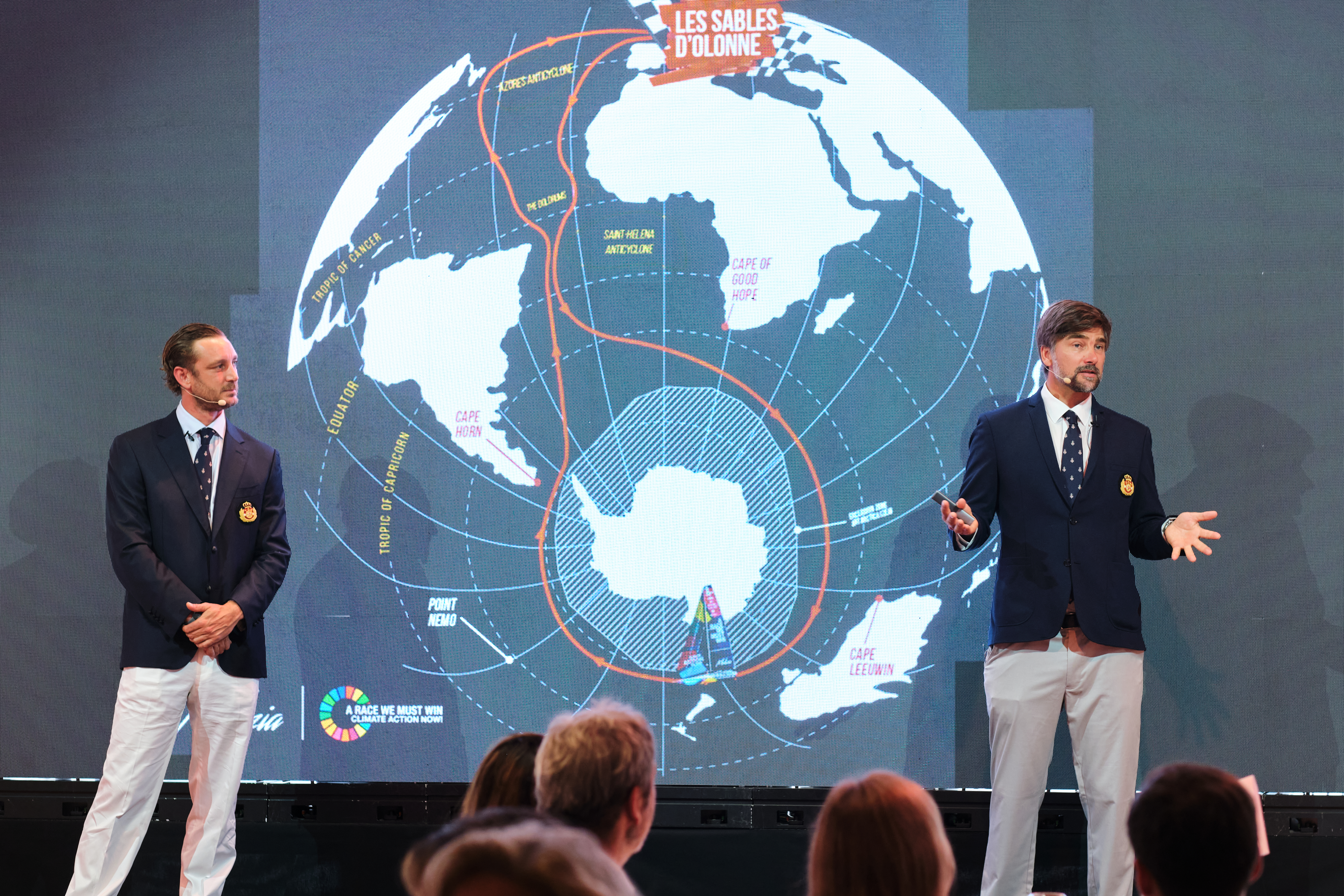 Pierre Casiraghi and Boris Herrmann on stage during the dinner-conference at the YCM