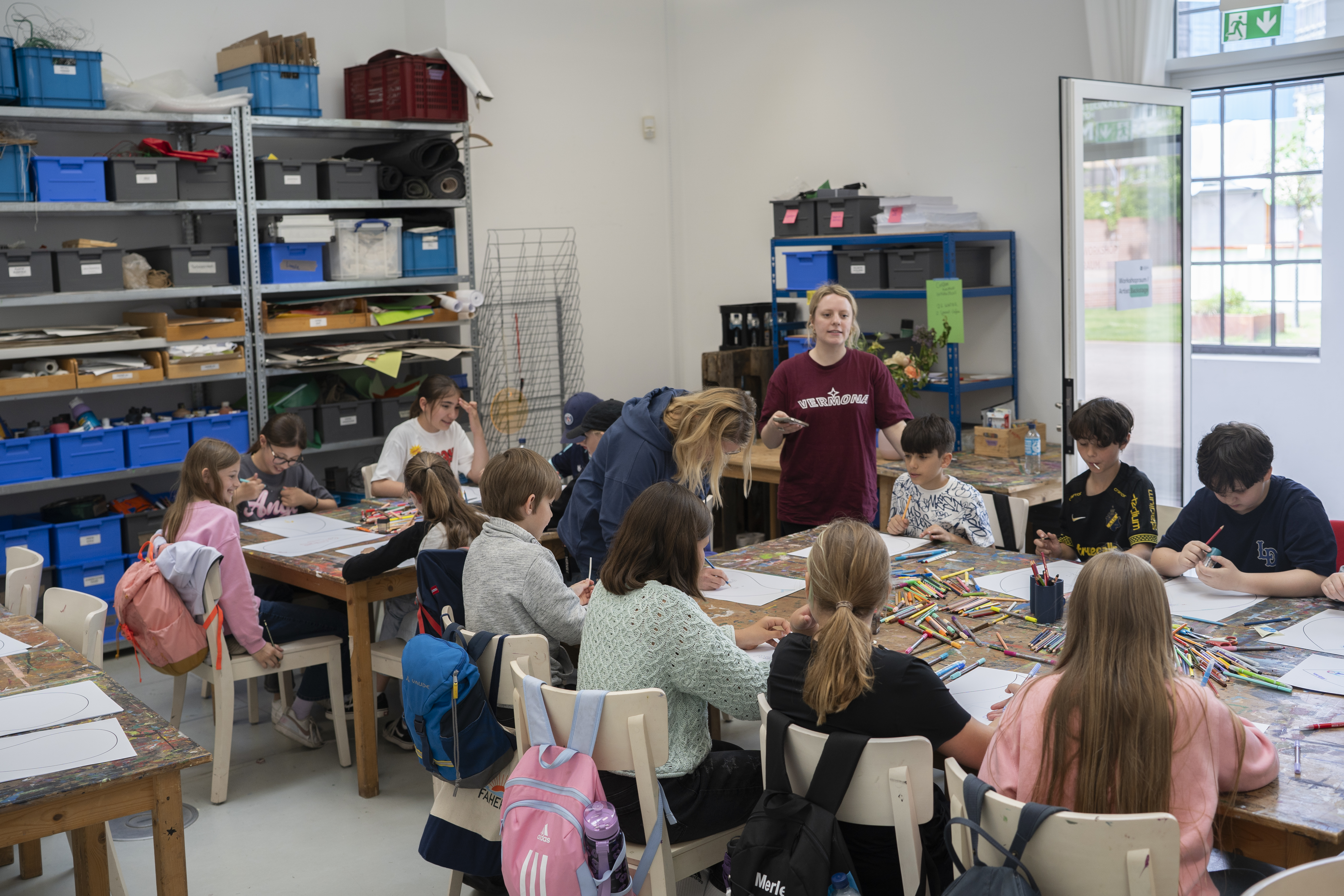Children engaged in creative projects with the Deichtorhallen.