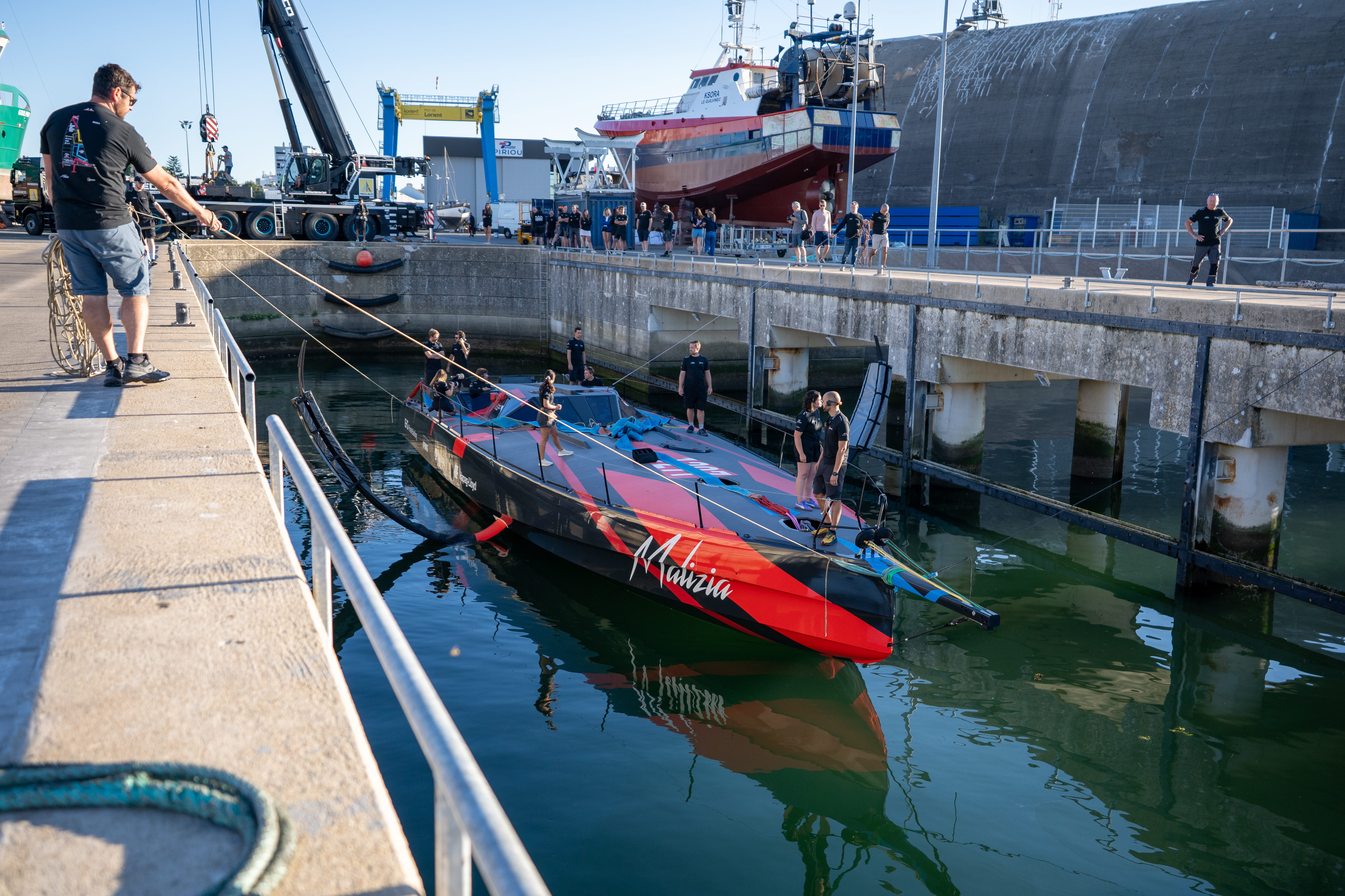Malizia 4 and the team, shortly after her very first splash early this morning