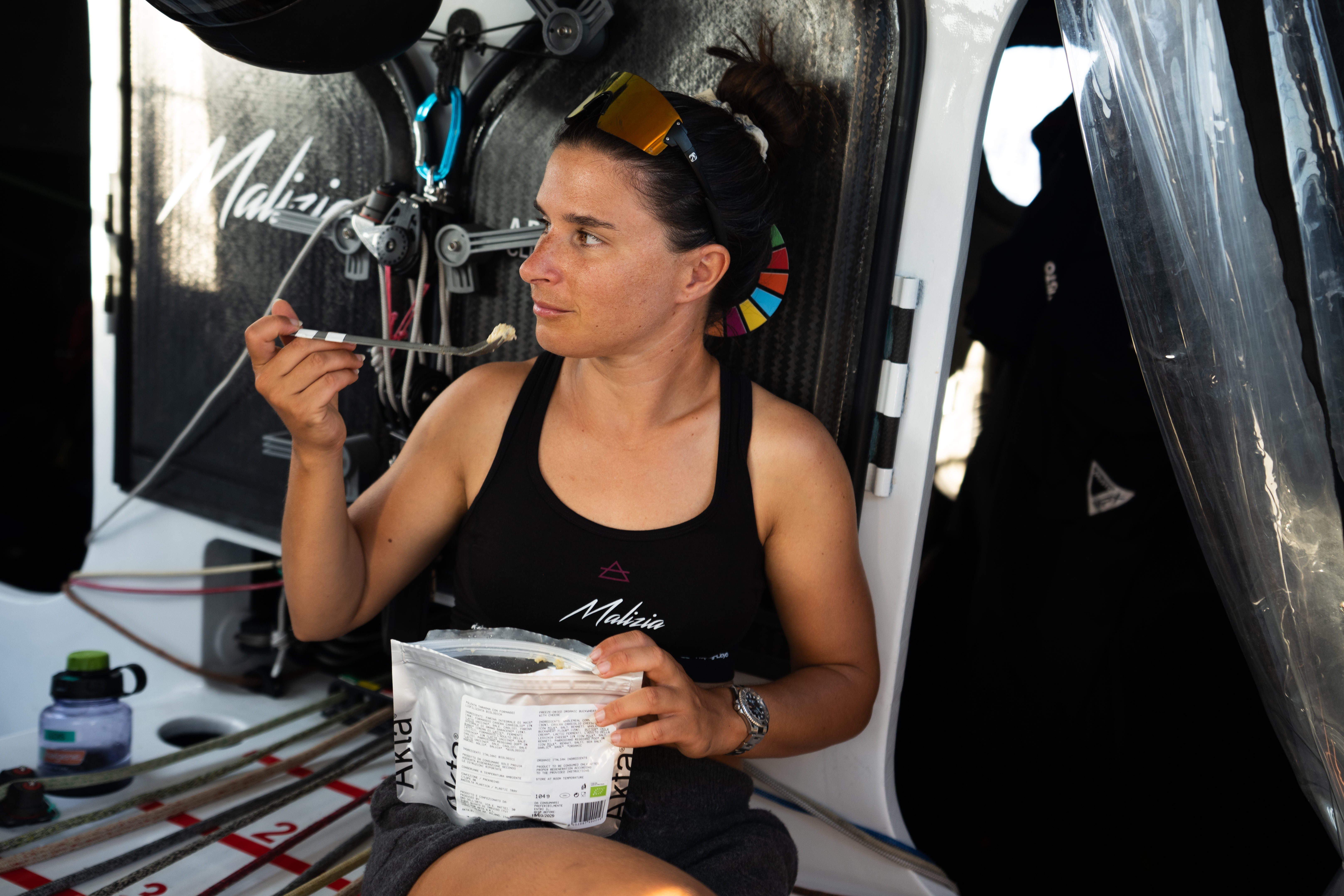 Cole Brauer eating onboard Malizia 4