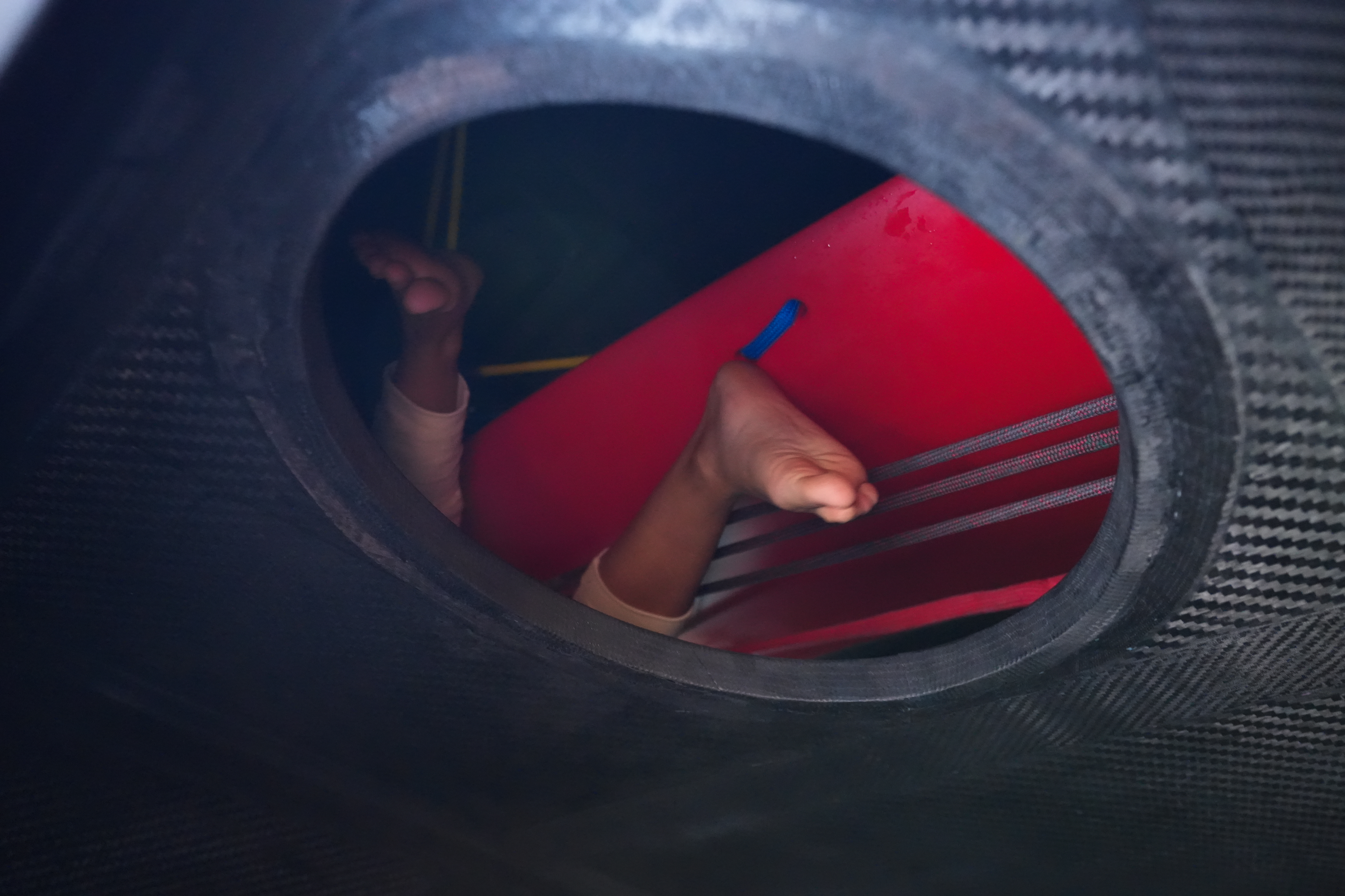 Cole's feet while she's repairing the foil case